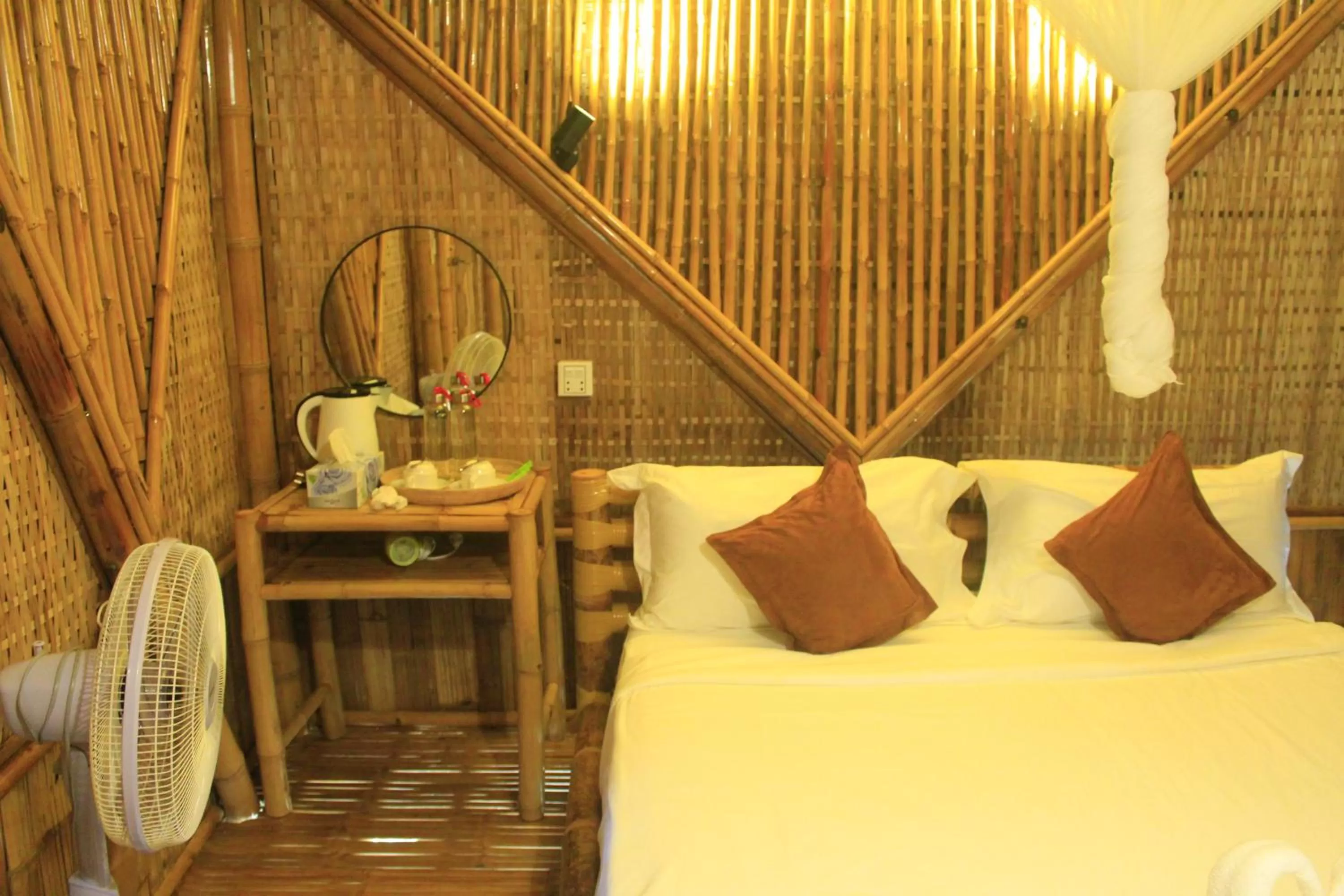 Bed in Hanchey Bamboo Resort