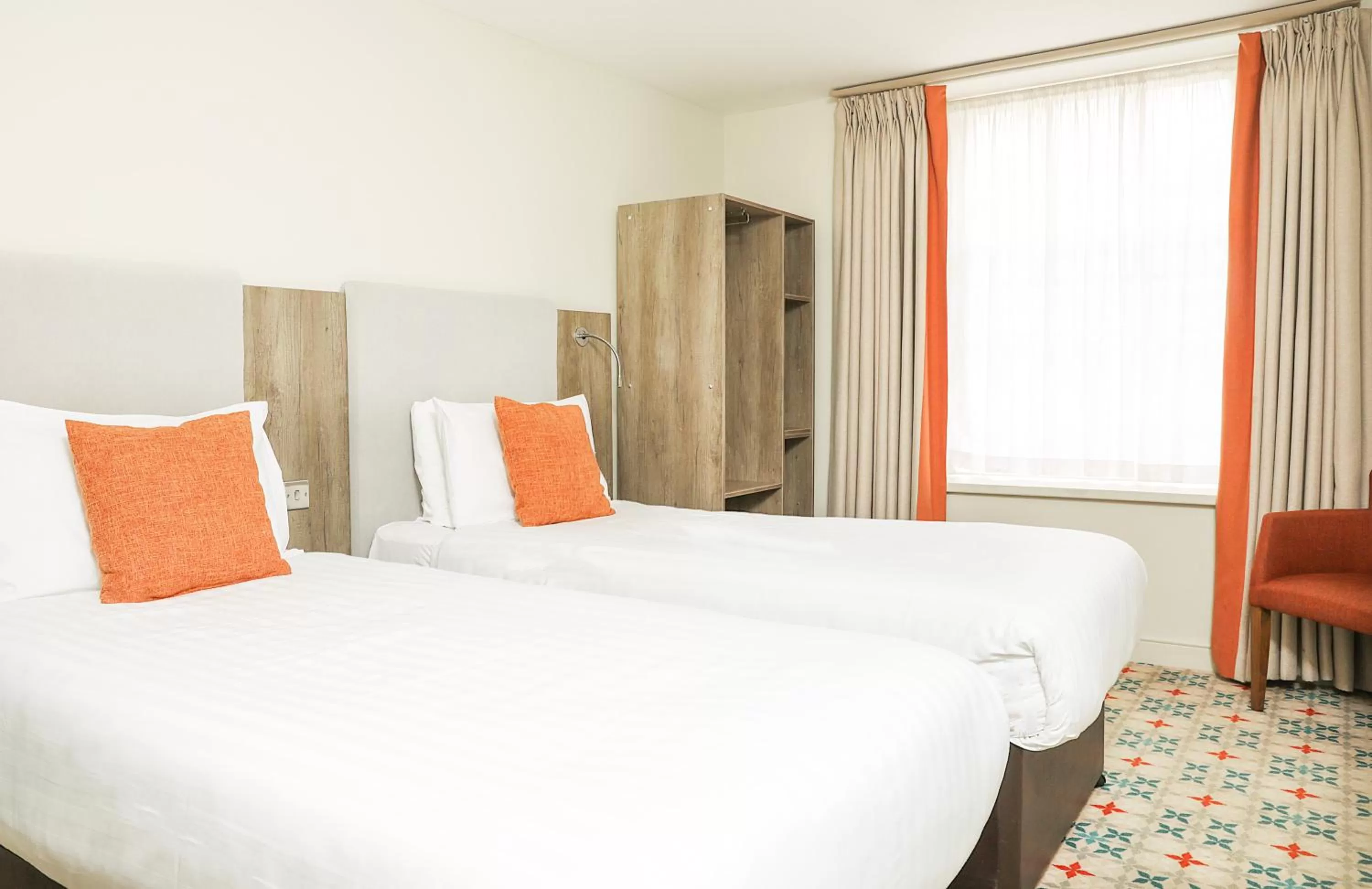 Bed in Cairn Hotel & Apartments