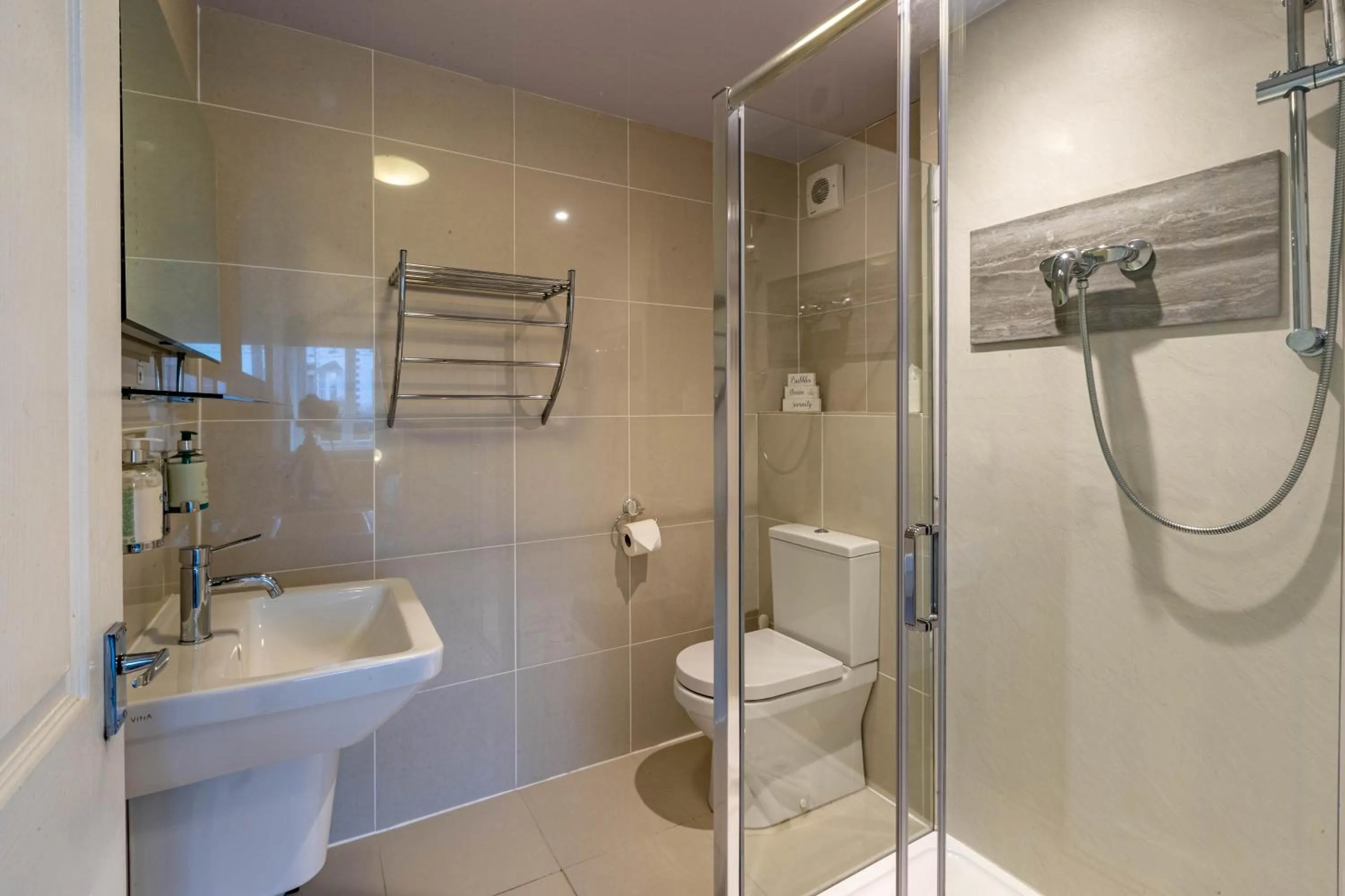 Shower in Holly Lodge Guest House with FREE off site health club