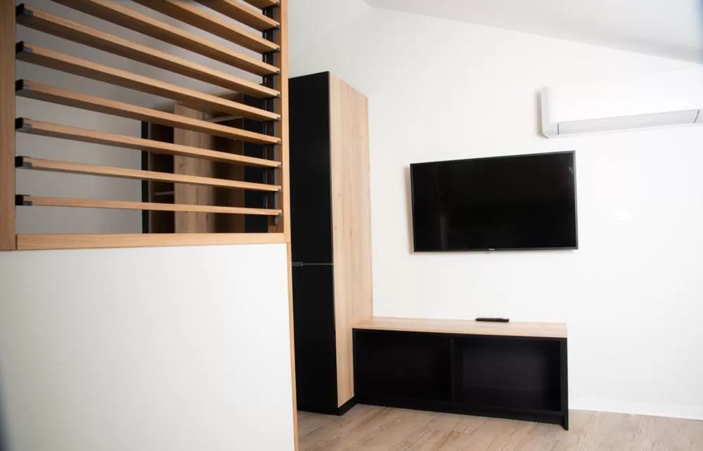 Communal lounge/ TV room in Hotel Les Dunes