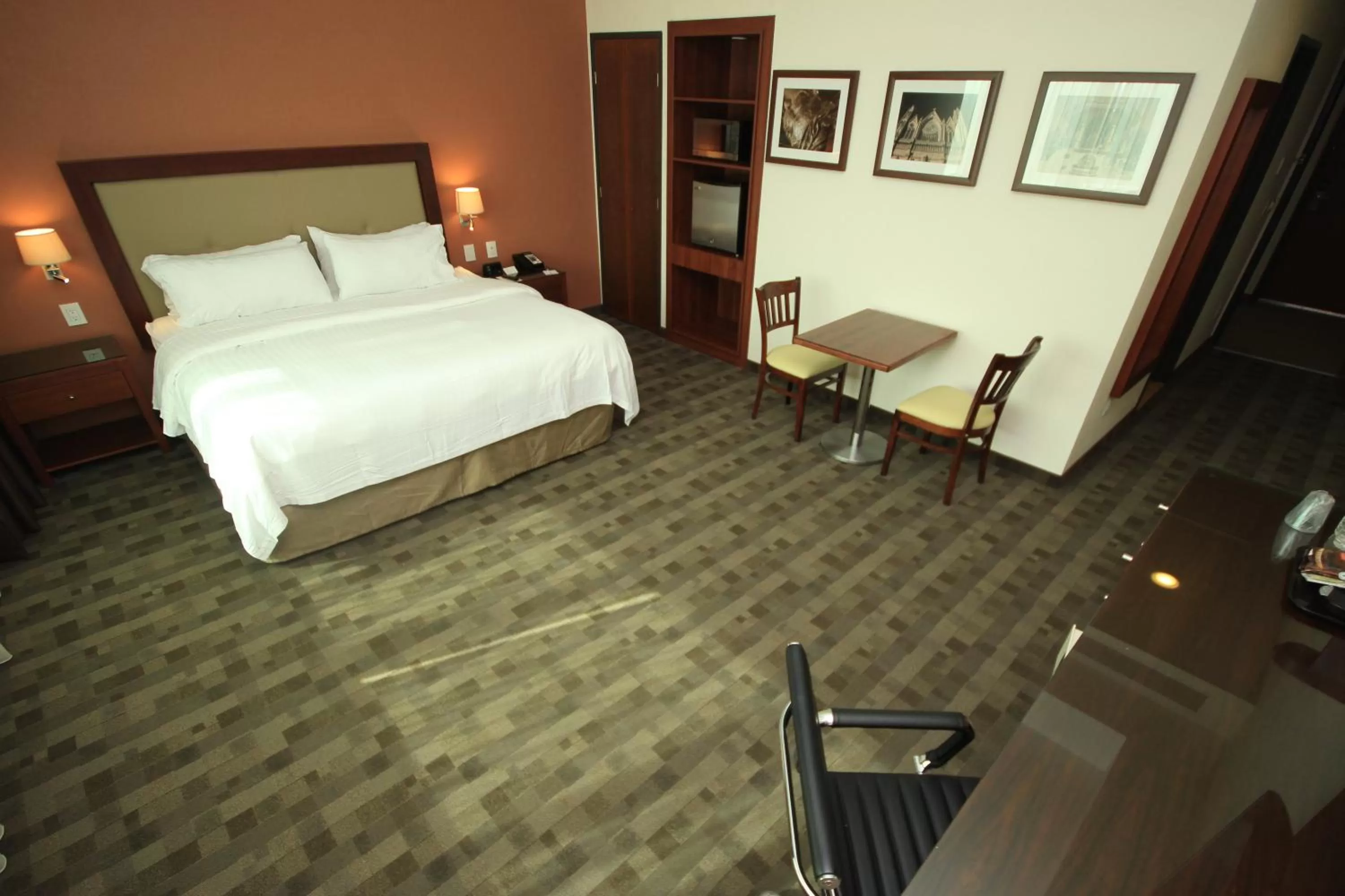 Photo of the whole room, Bed in Holiday Inn & Suites Plaza Mayor by IHG