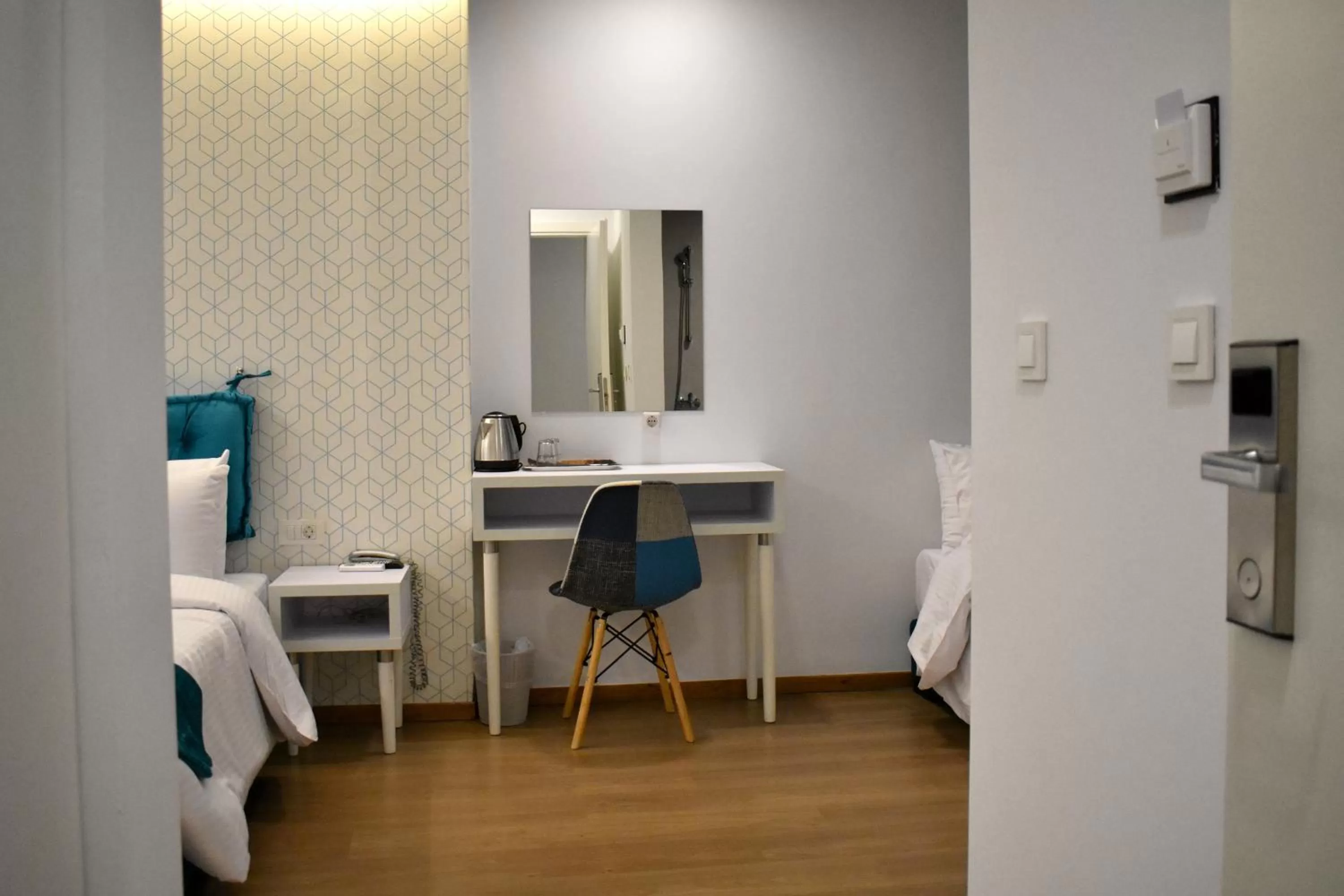 Bed in Athenian Montaza Hotel