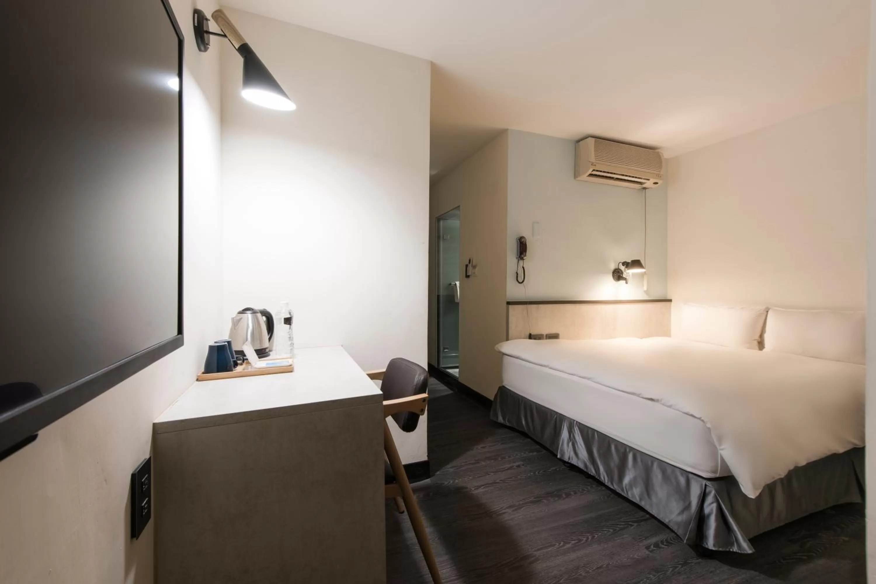 Bed in Raise Hotel Taichung