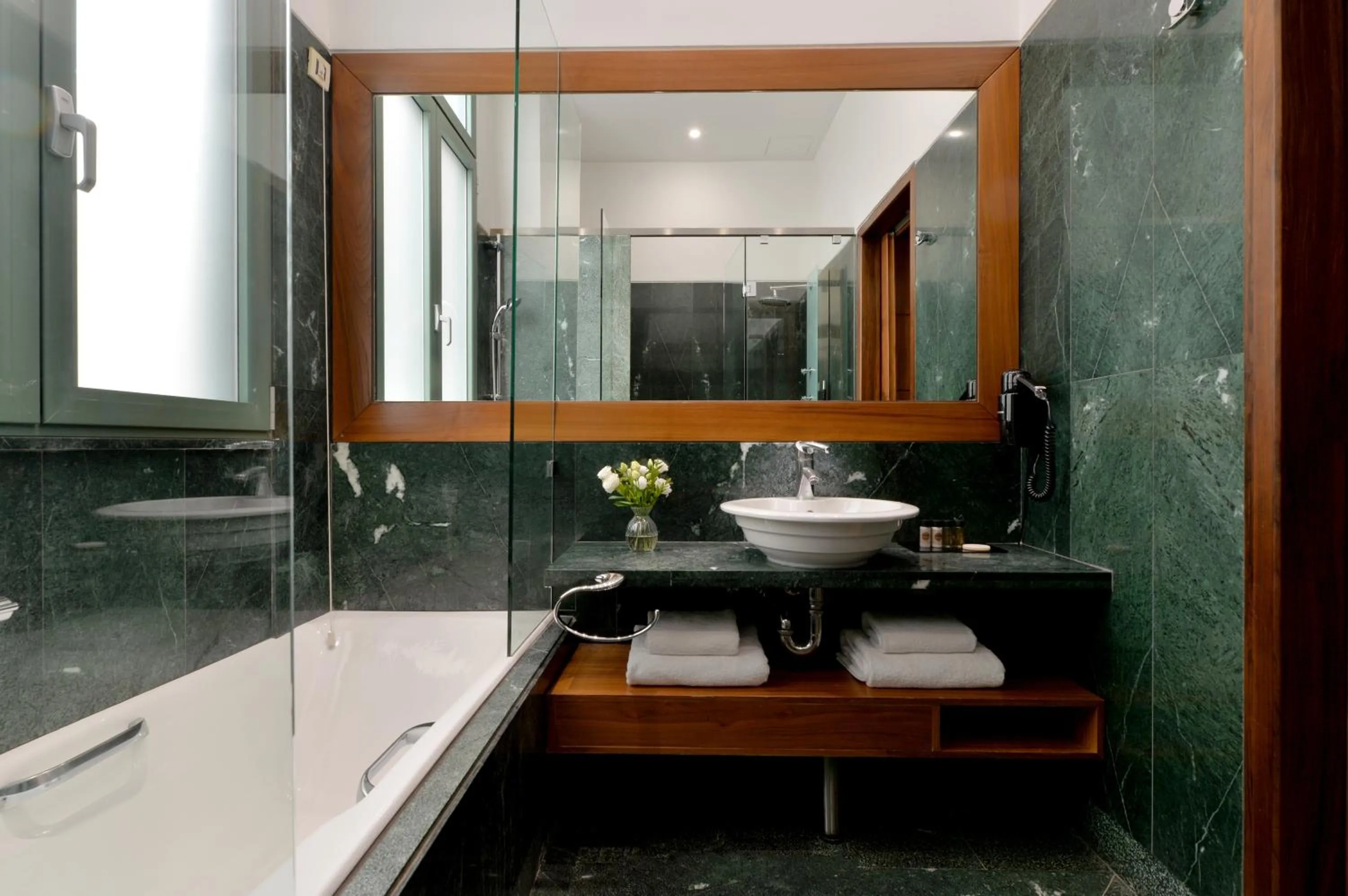 Shower in Athenaeum Eridanus Luxury Hotel