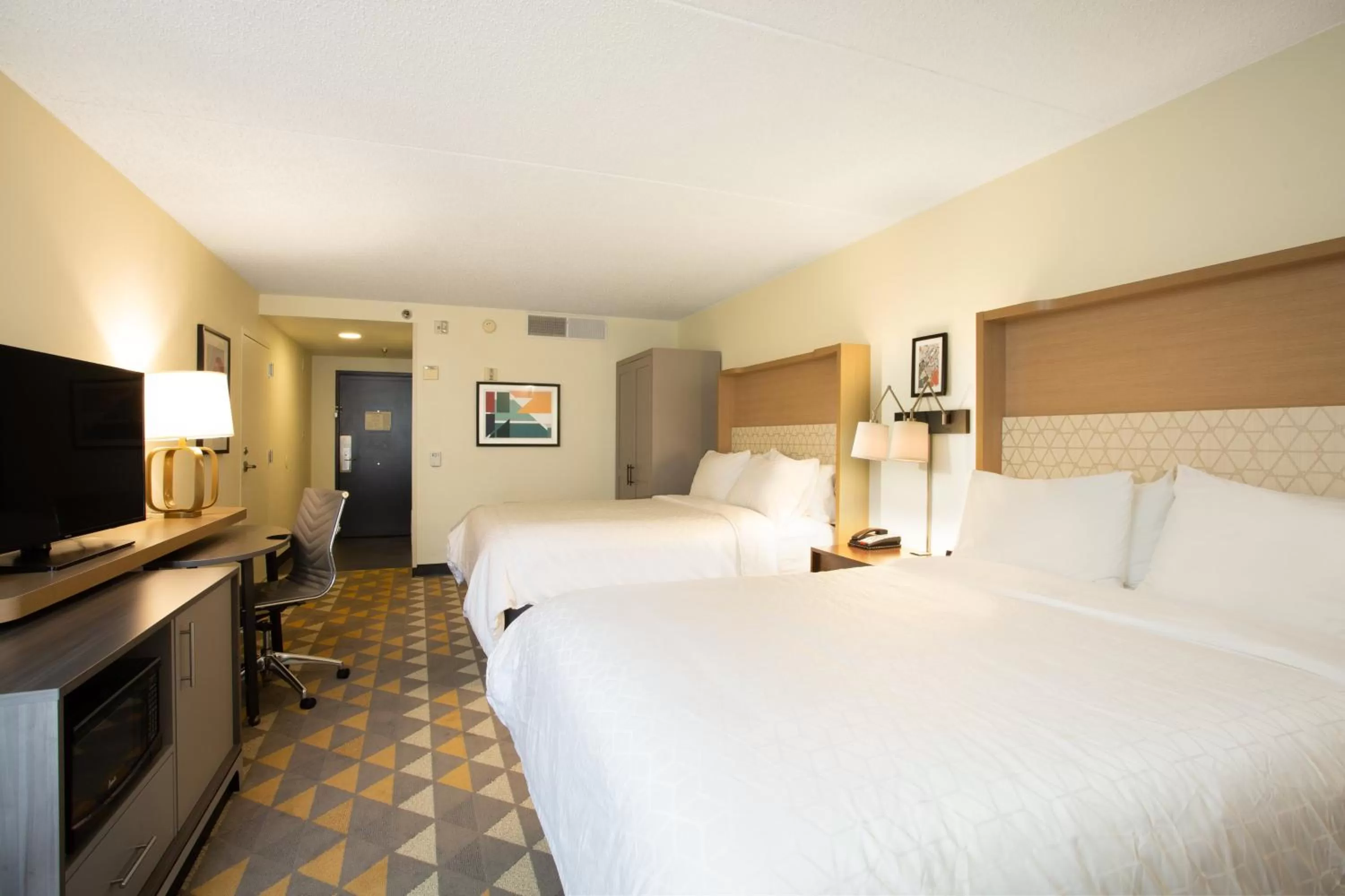 Photo of the whole room, Bed in Holiday Inn Morgantown - Reading Area by IHG