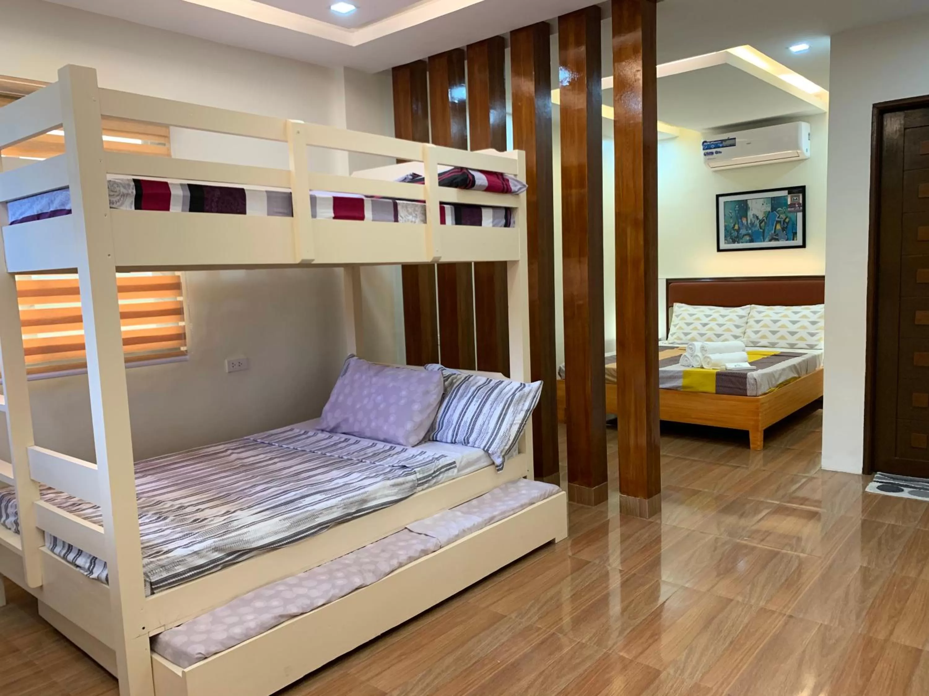 Bed in Rustic Crown Hotel