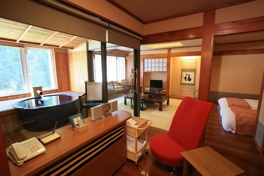 Bed in Hotel Taisetsu Onsen&Canyon Resort