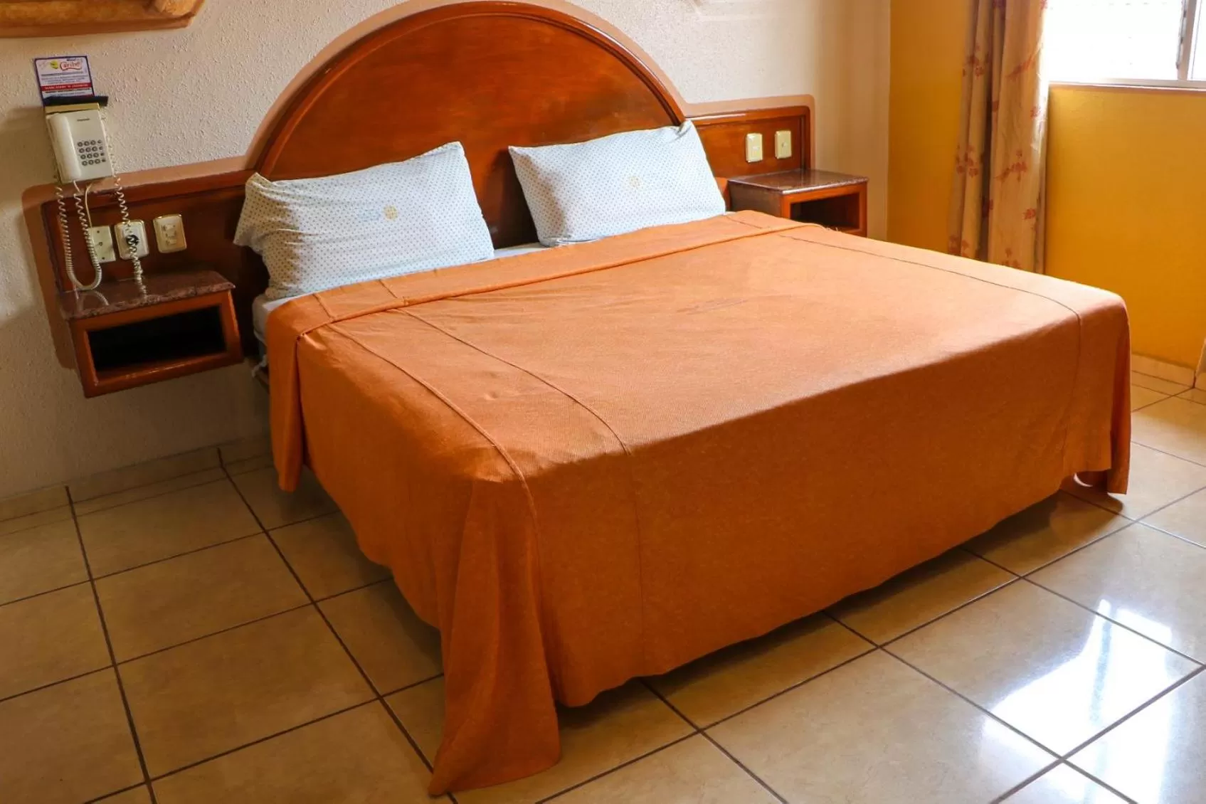 Photo of the whole room, Bed in Motel Caribe