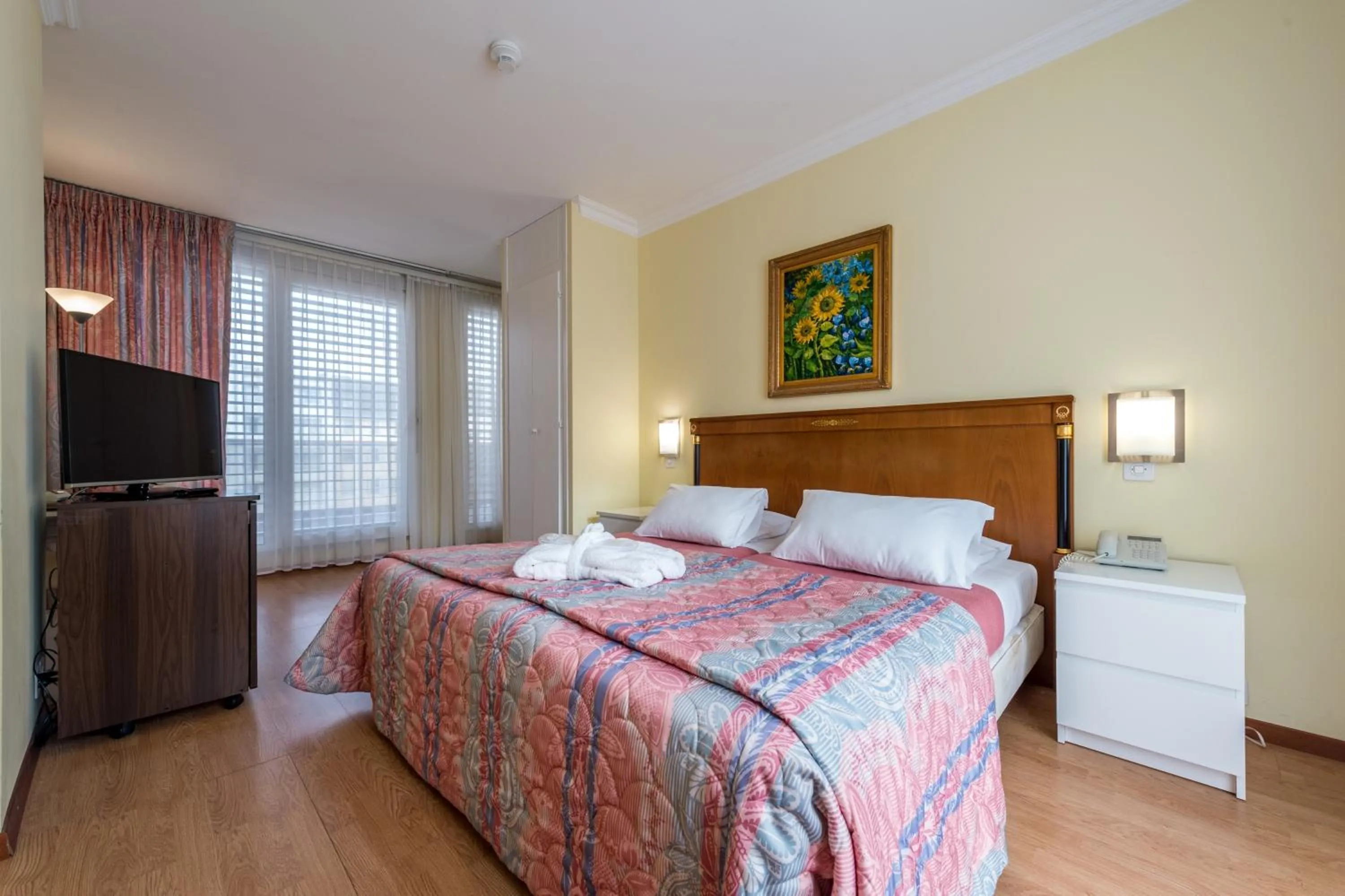 Bed in Hotel Churchill