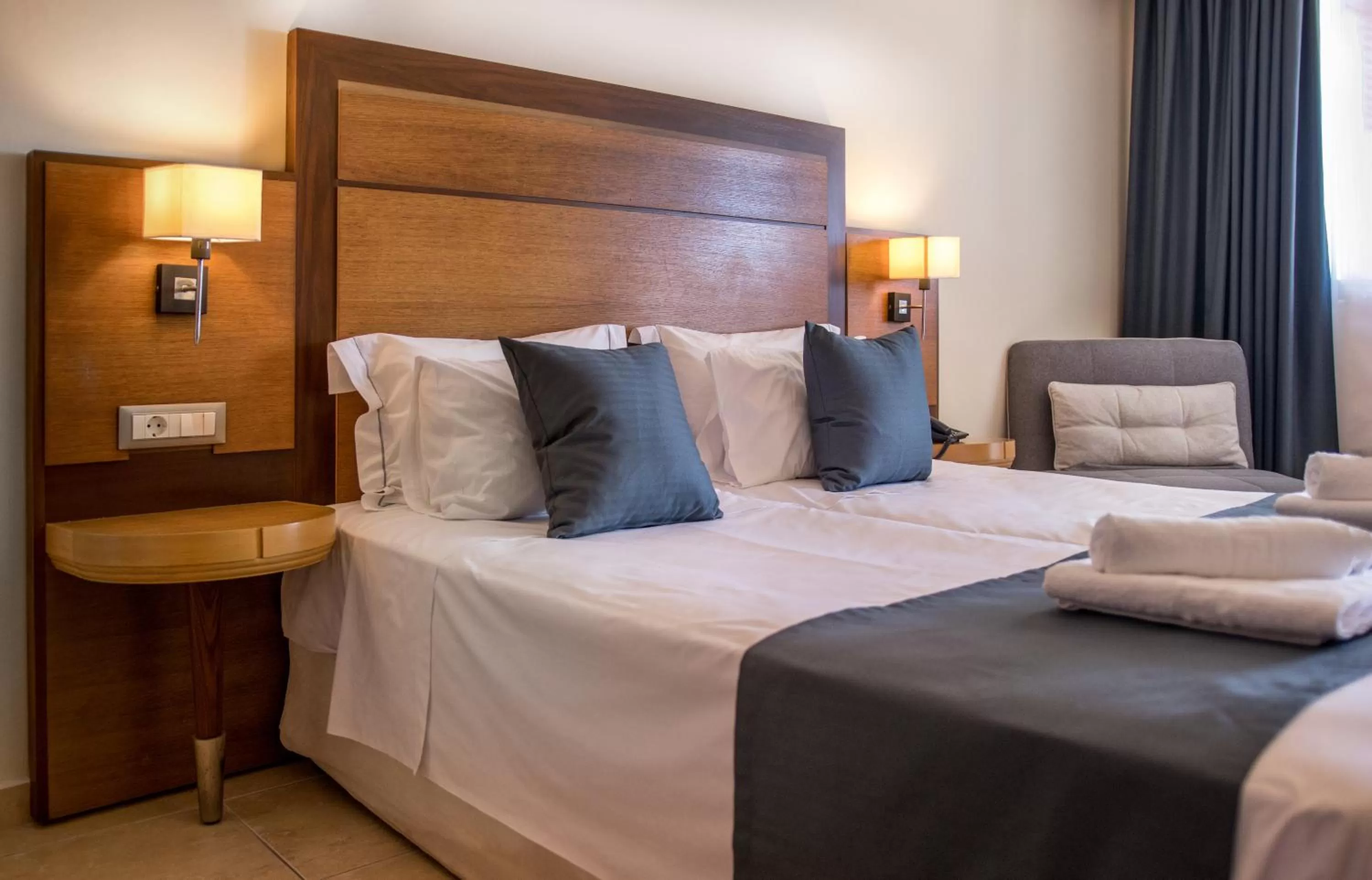 Bed in Manousos City Hotel