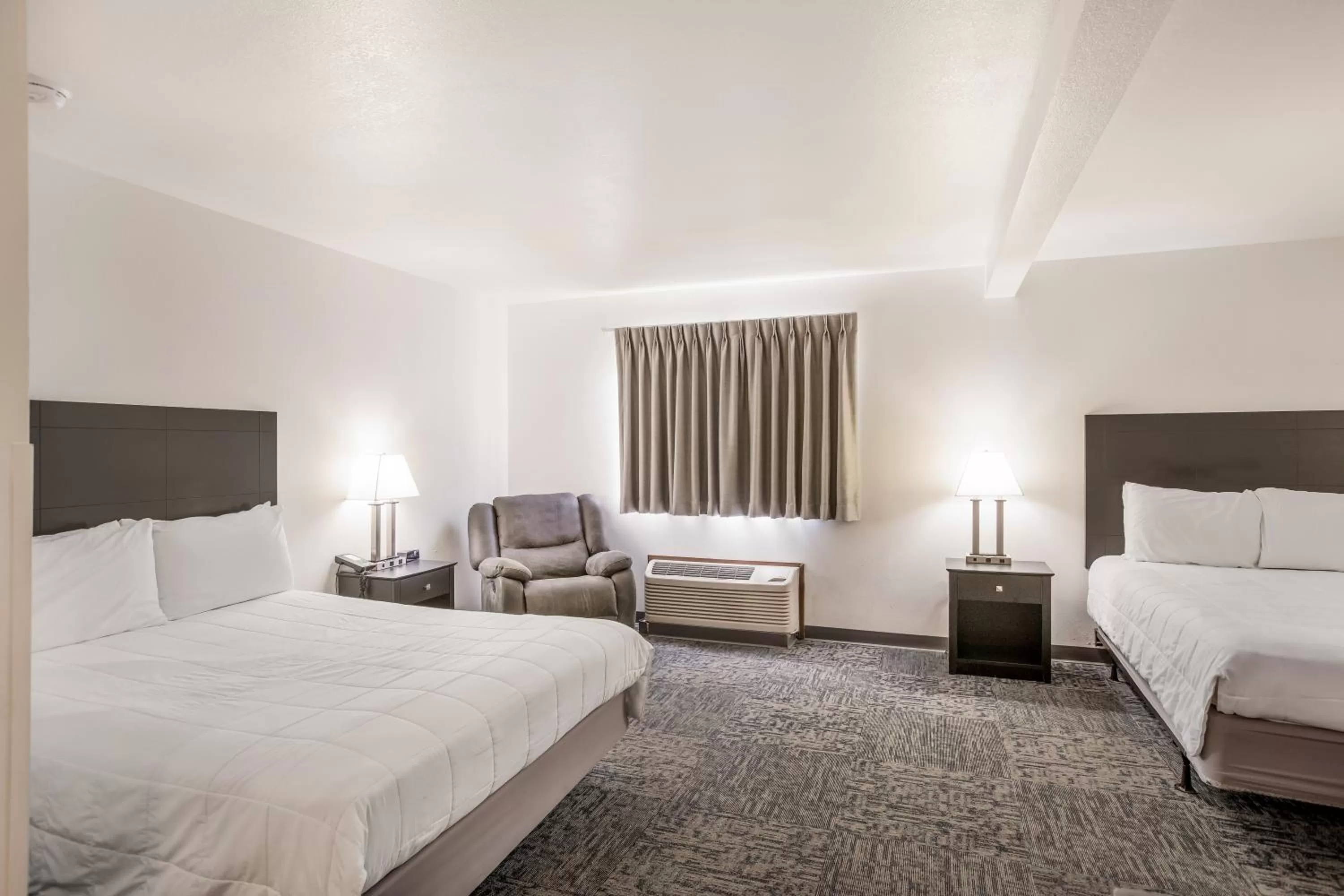 Bed in Americas Best Value Inn & Suites-Birch Run