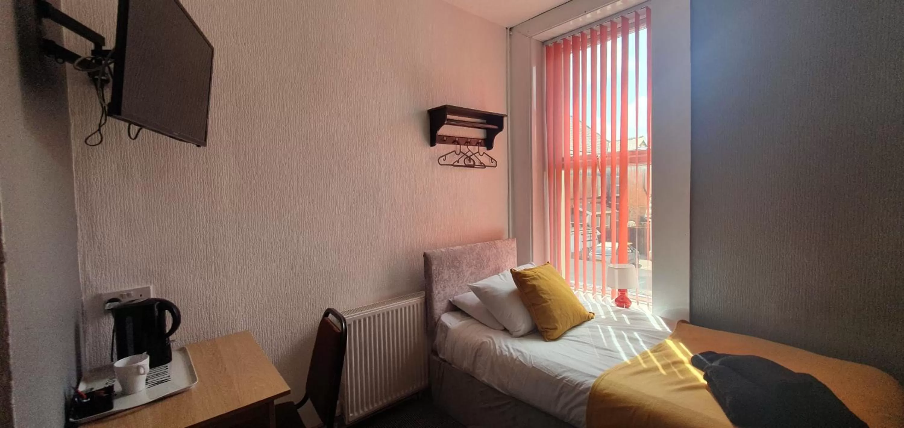 Bed in Palm Beach Hotel by the Sea