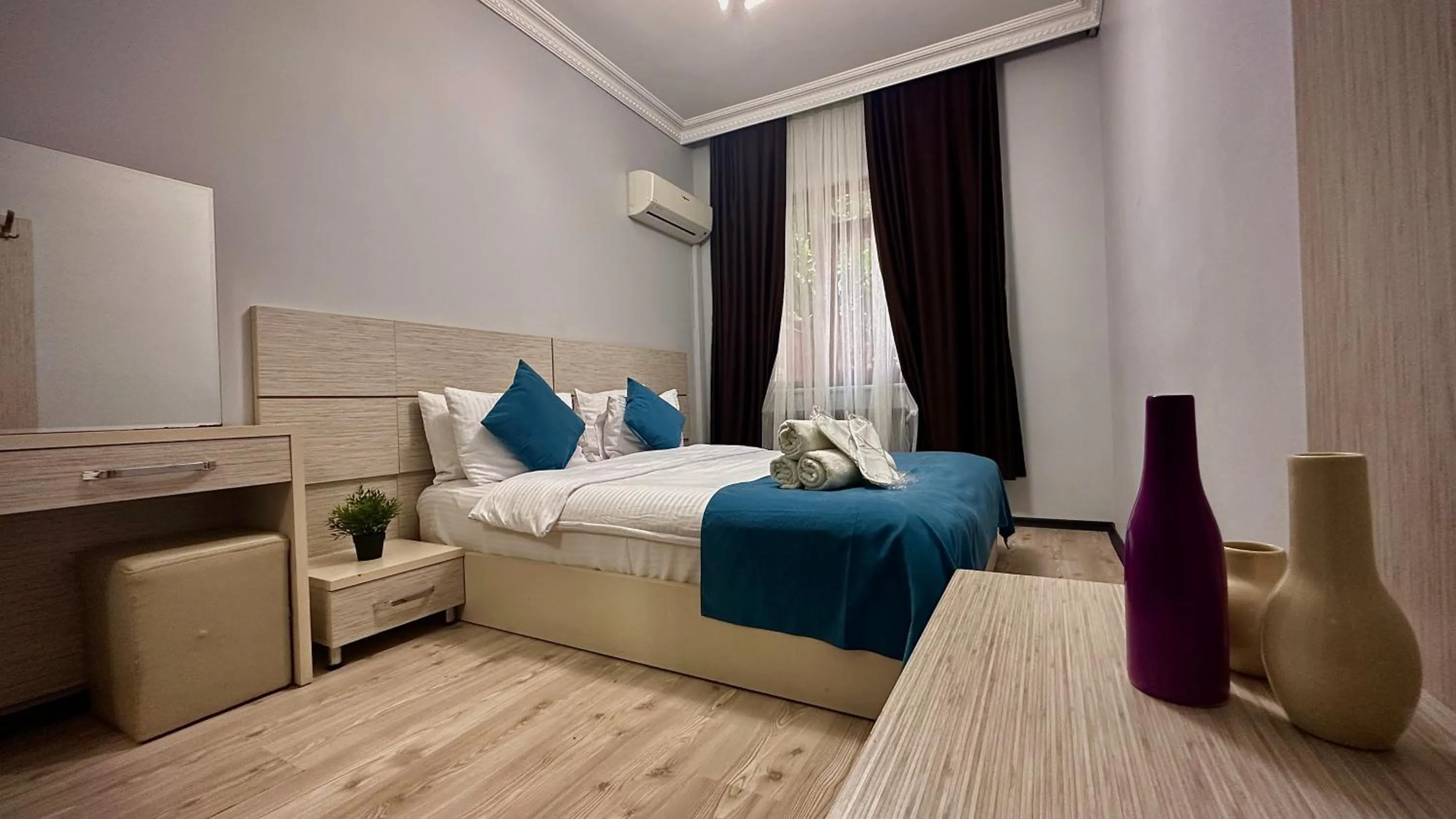 Bed in Overland Residence