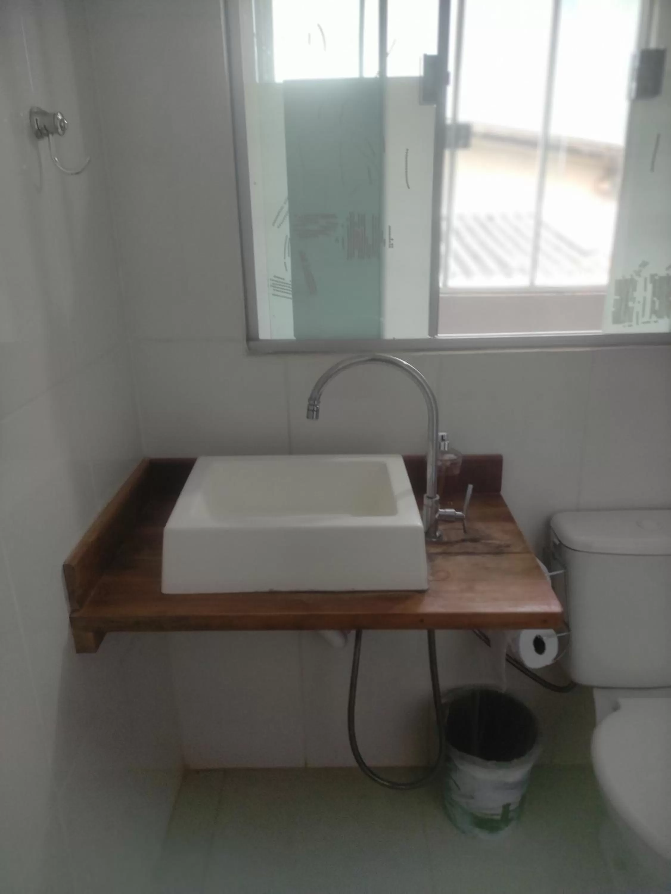 Bathroom in Pousada da Gi Suítes e Turismo