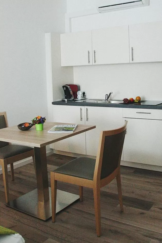 Kitchen or kitchenette in Four Stars by City Hotel