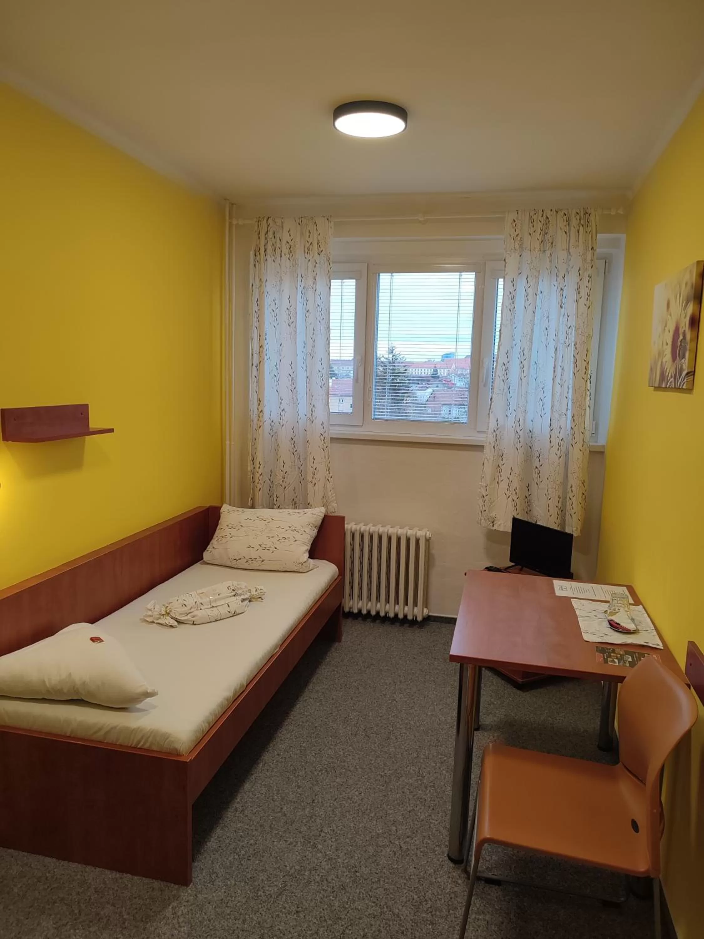 Bed in BEST Hotel Garni