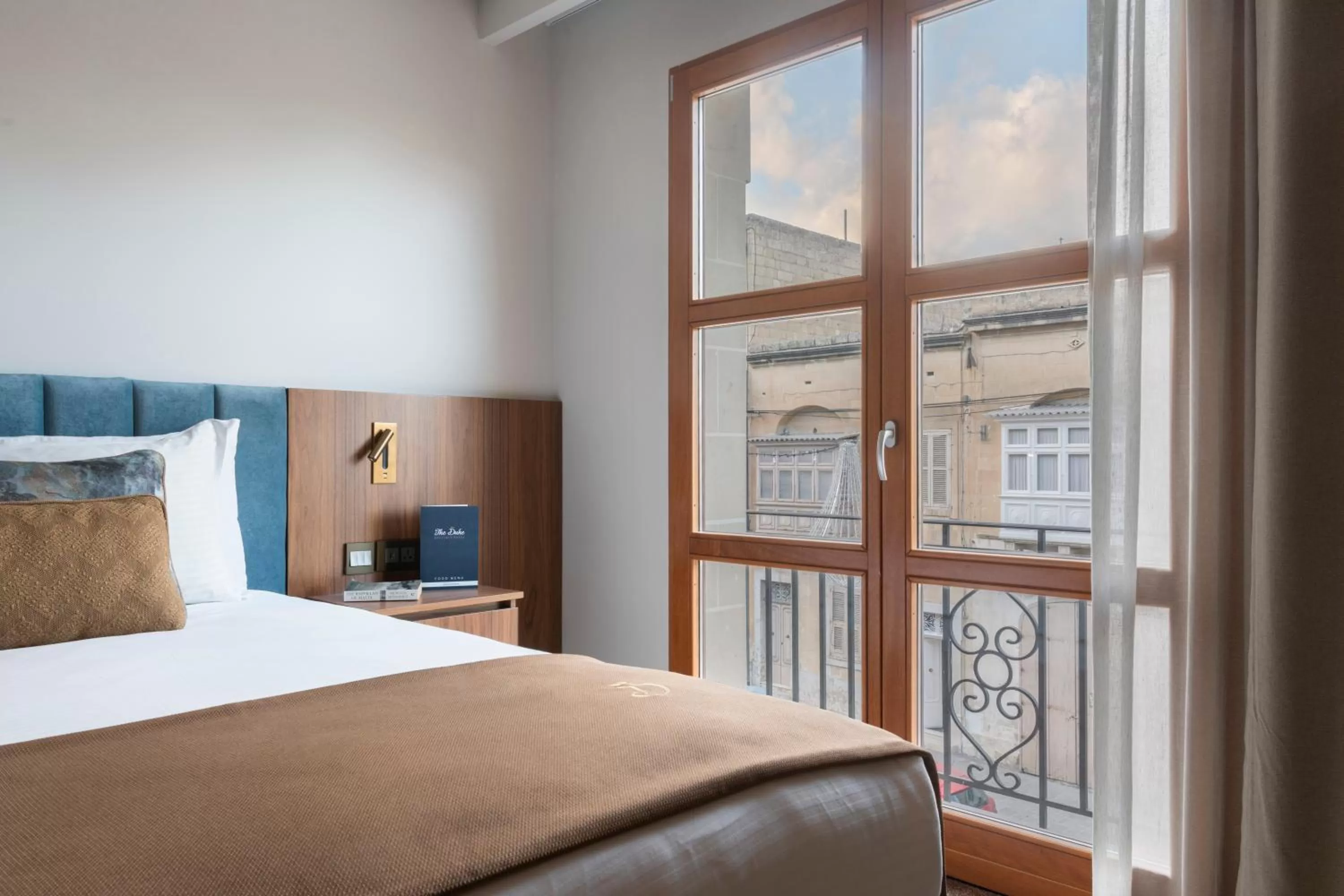 Bed in The Duke Boutique Hotel