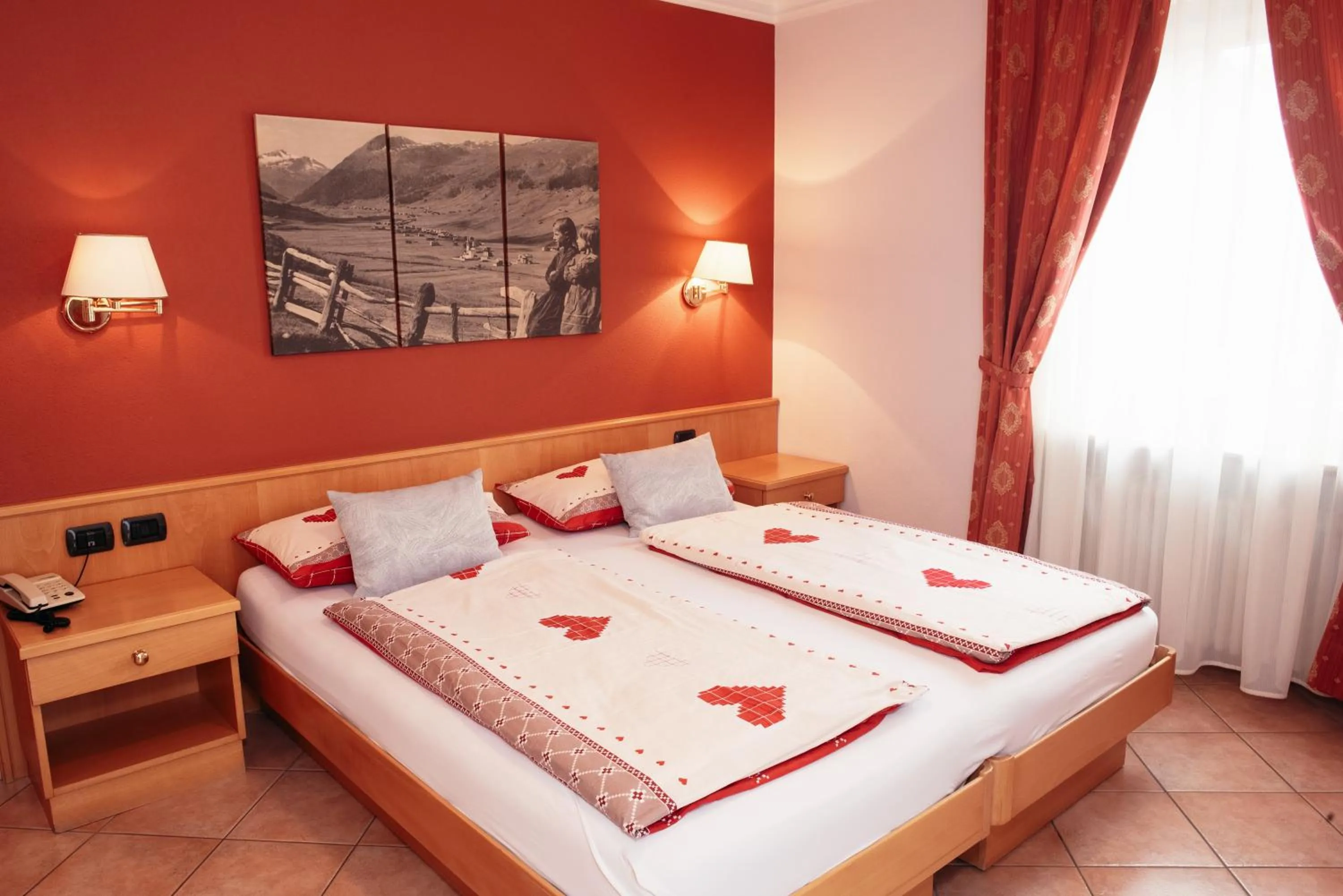 Bed in Hotel Garni Rin Da Rin