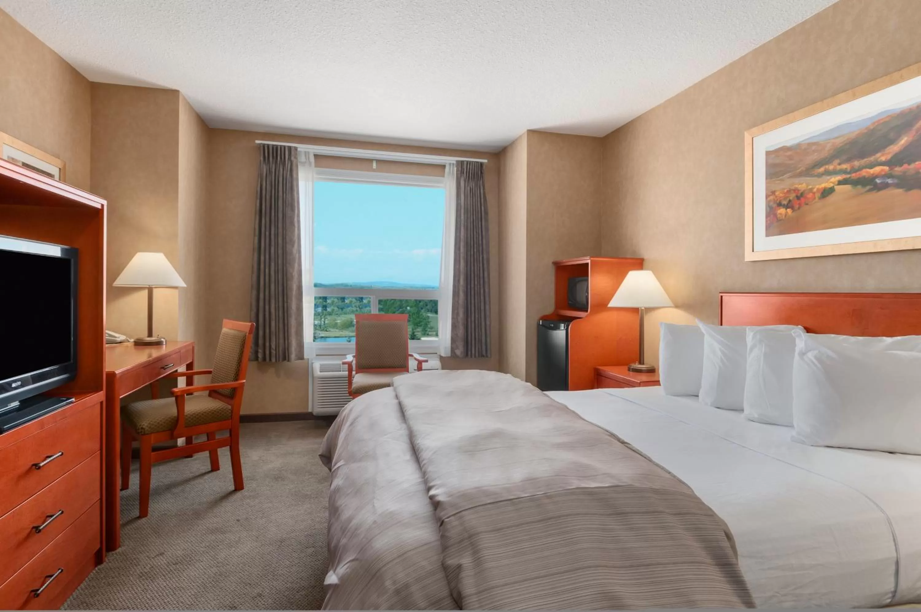 Bed in Days Inn & Suites by Wyndham Cochrane