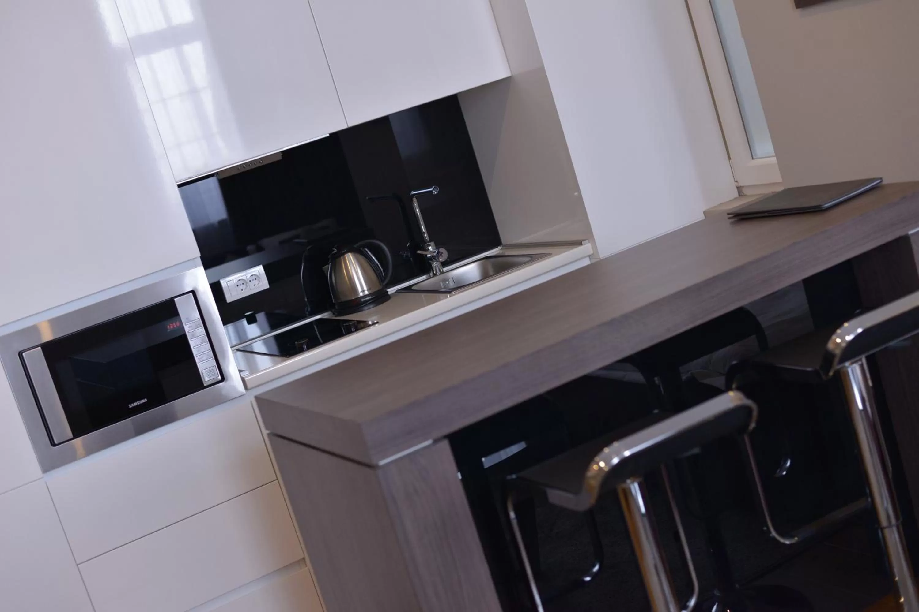 Kitchen or kitchenette in Boutique Rooms