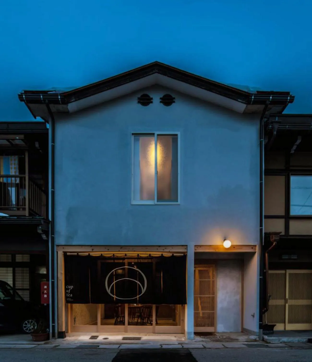 Property building in cup of tea