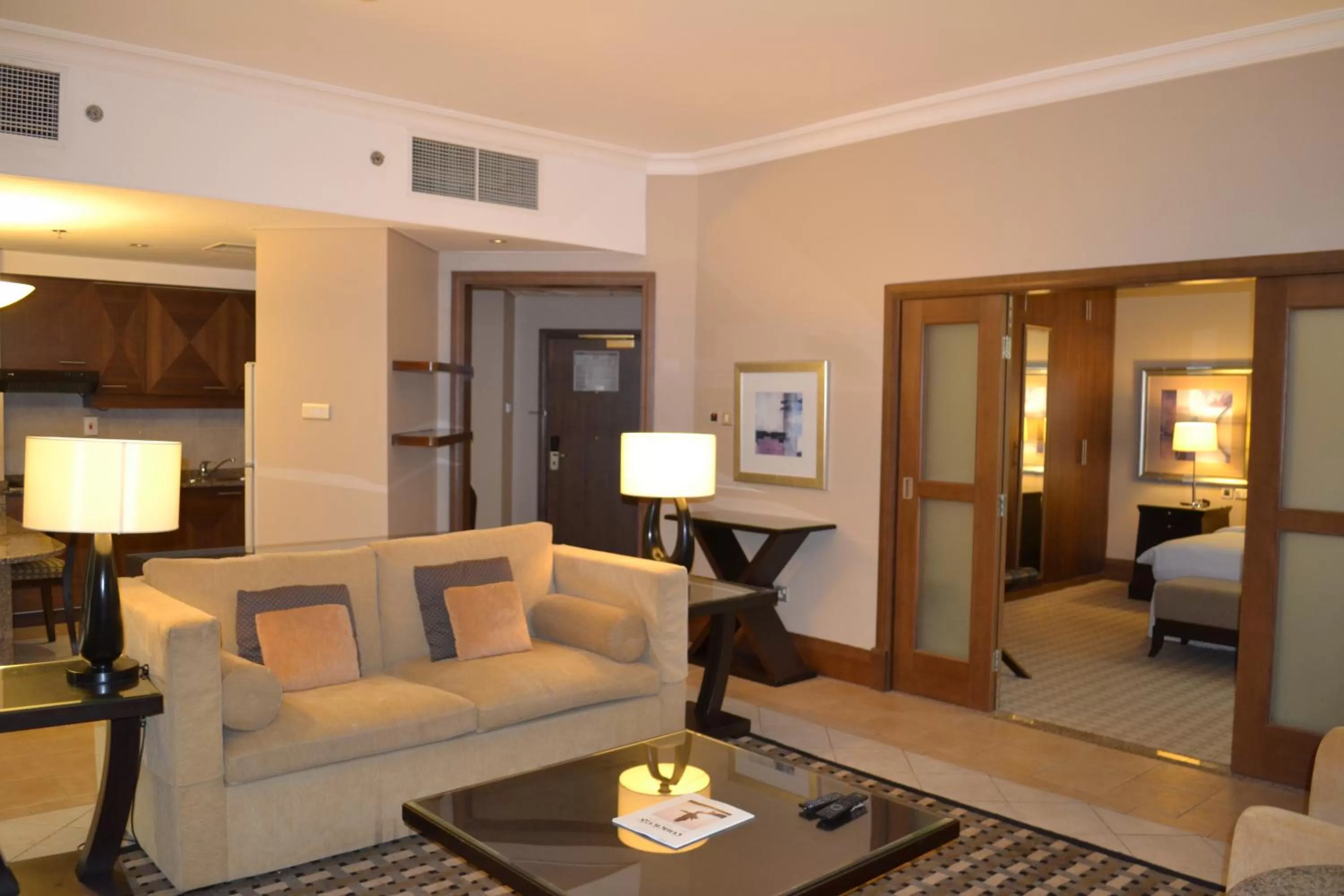 Living room, Bed in Sheraton Khalidiya Hotel