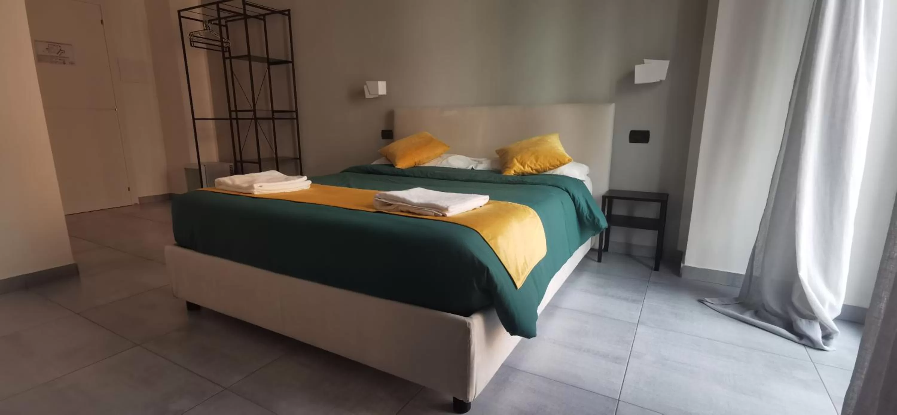 Bed in Hi Relais Rooms