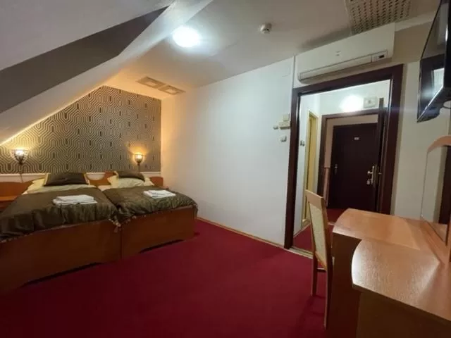 Bed in Hotel Minaret&Étterem