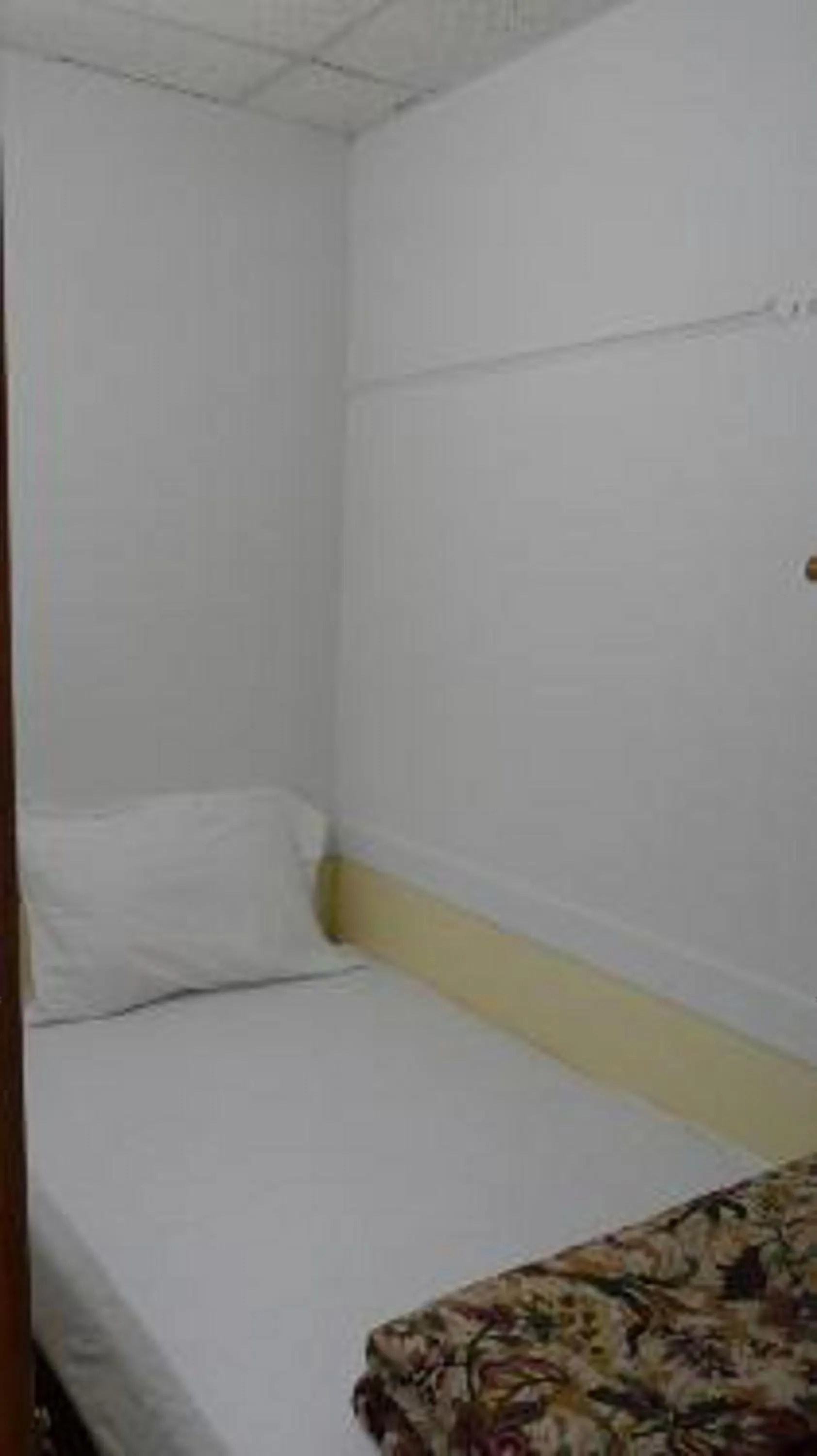 Bed in Bowery Grand Hotel