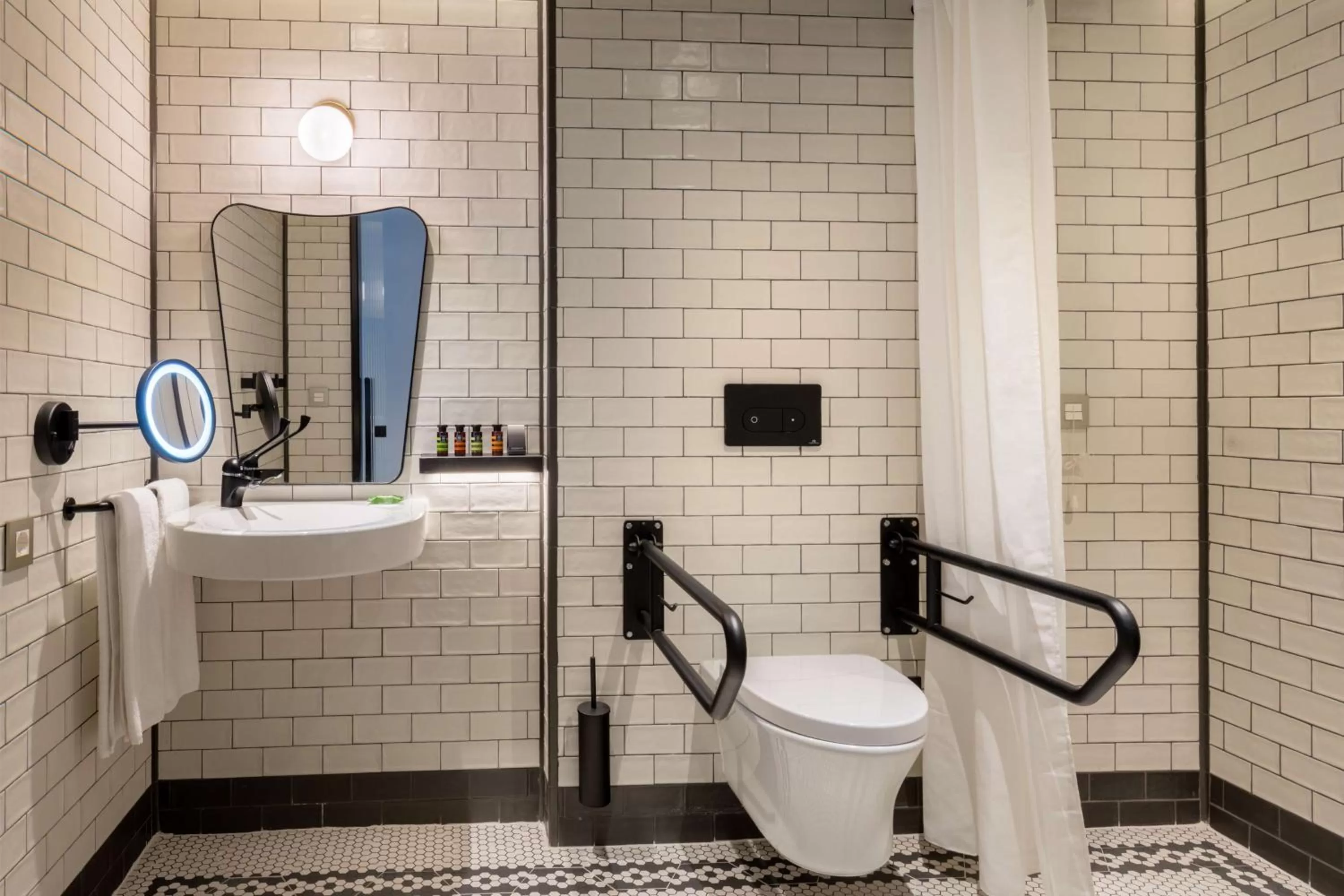 Bathroom in Canopy by Hilton Madrid Castellana