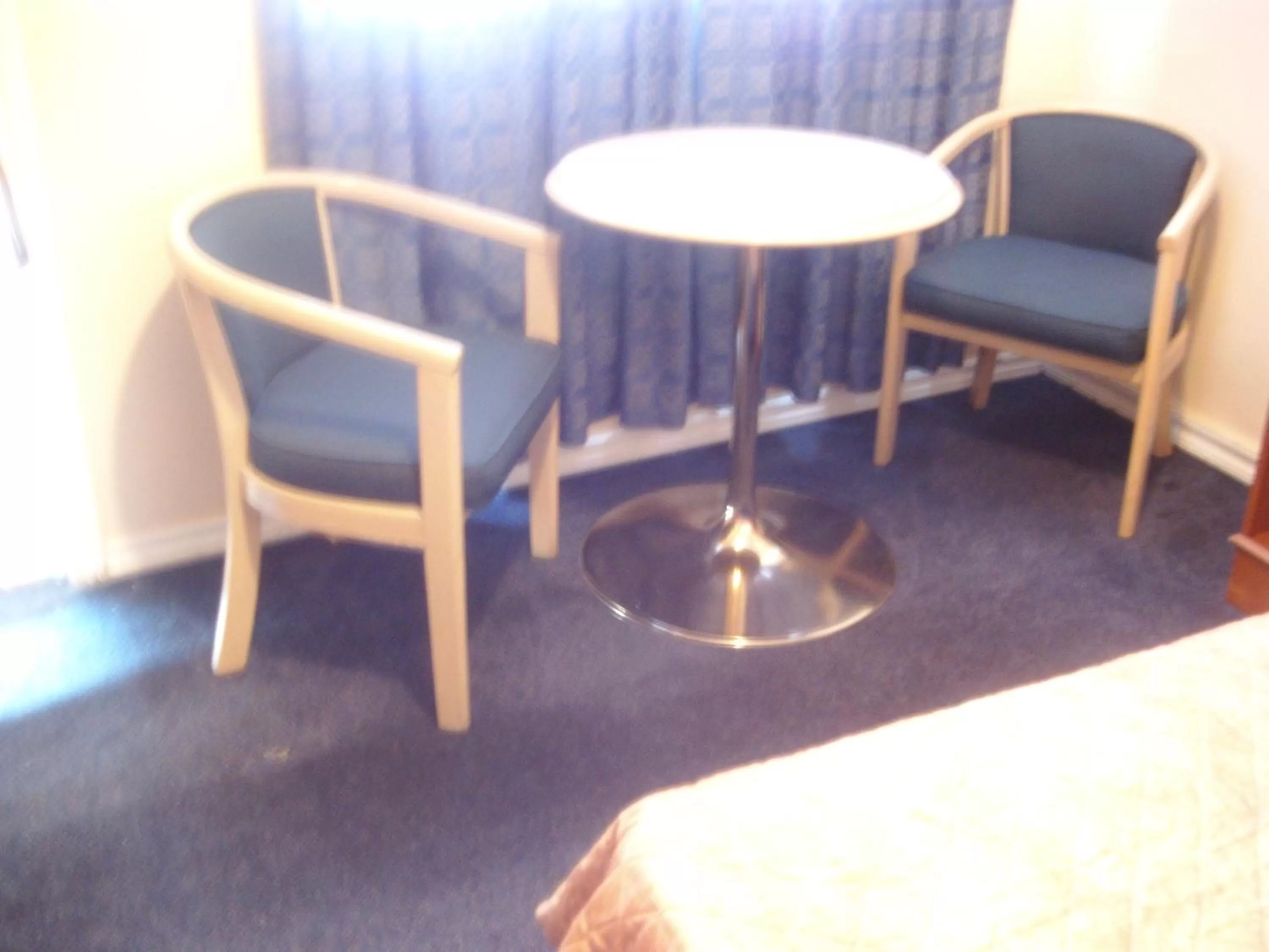 Seating area, Bed in Star Inn by Elevate Rooms