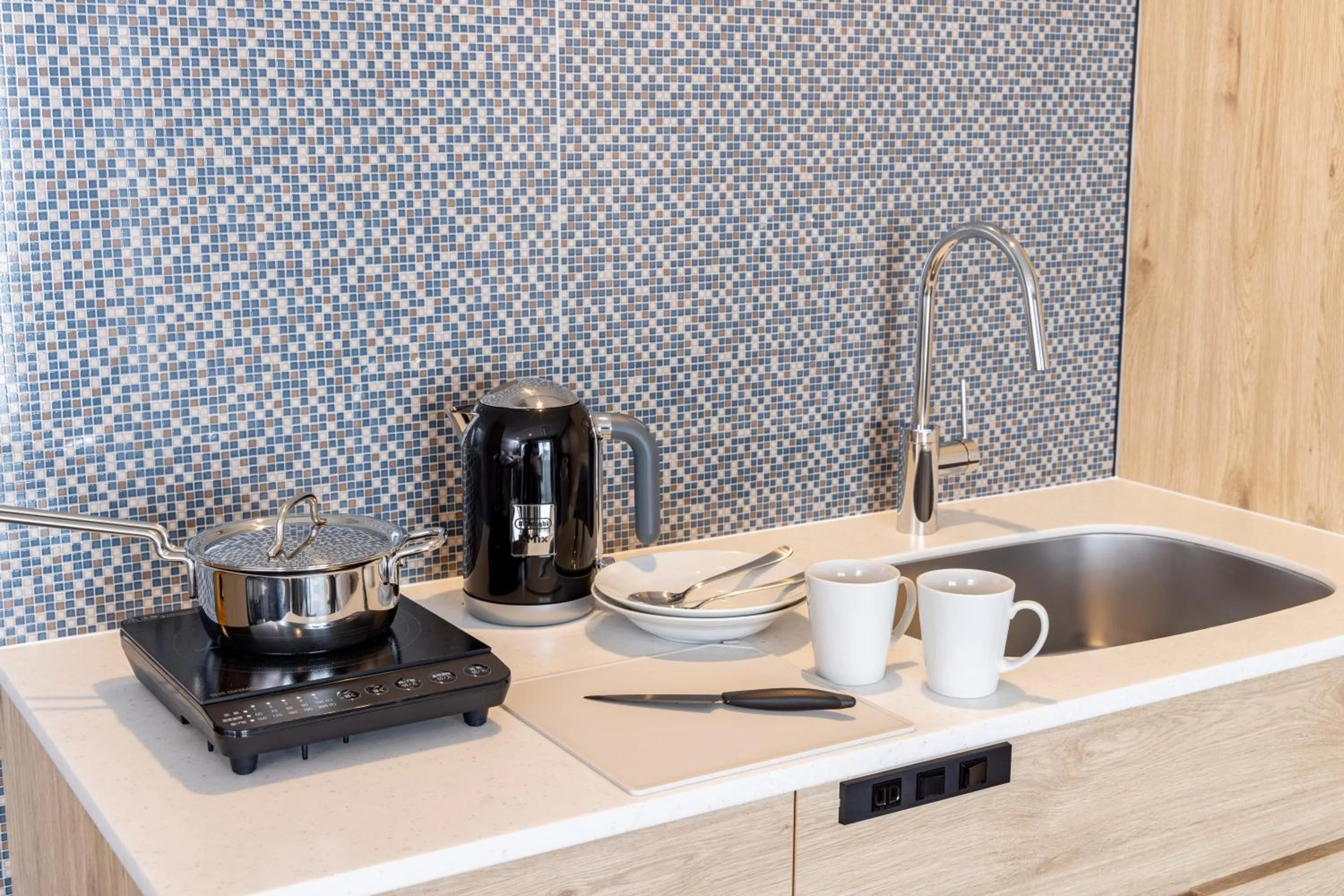 Kitchen or kitchenette in Tokyu Stay Shibuya