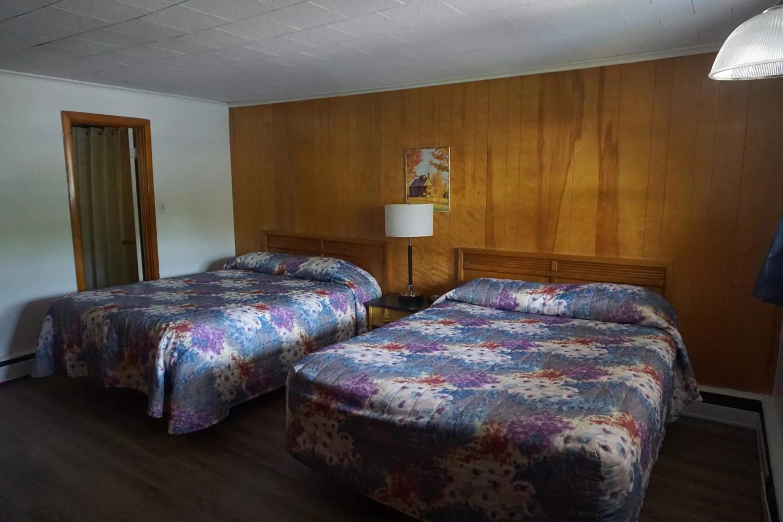 Bed in Northern Peaks Motor Inn