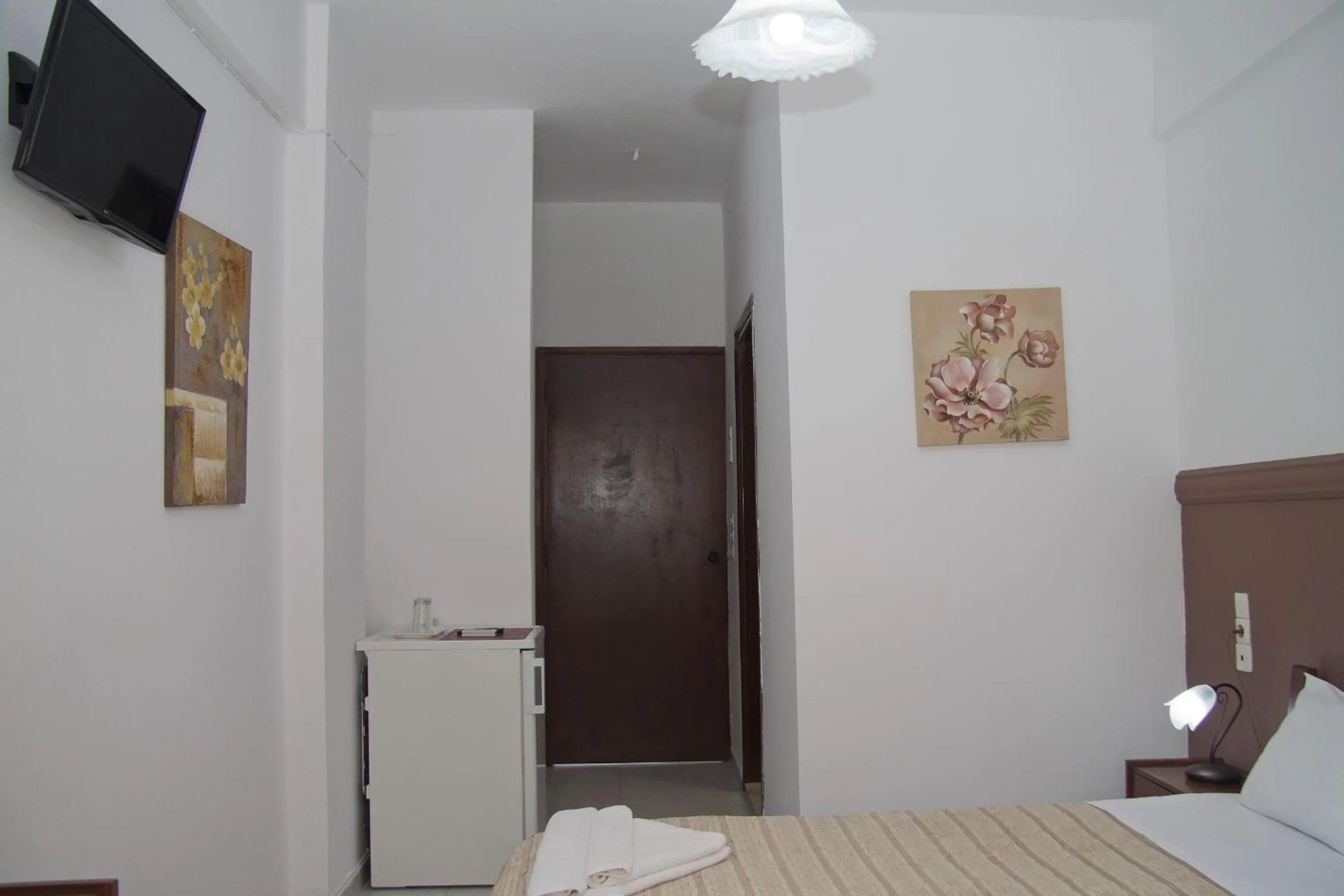 Photo of the whole room, Bed in Danaos Hotel