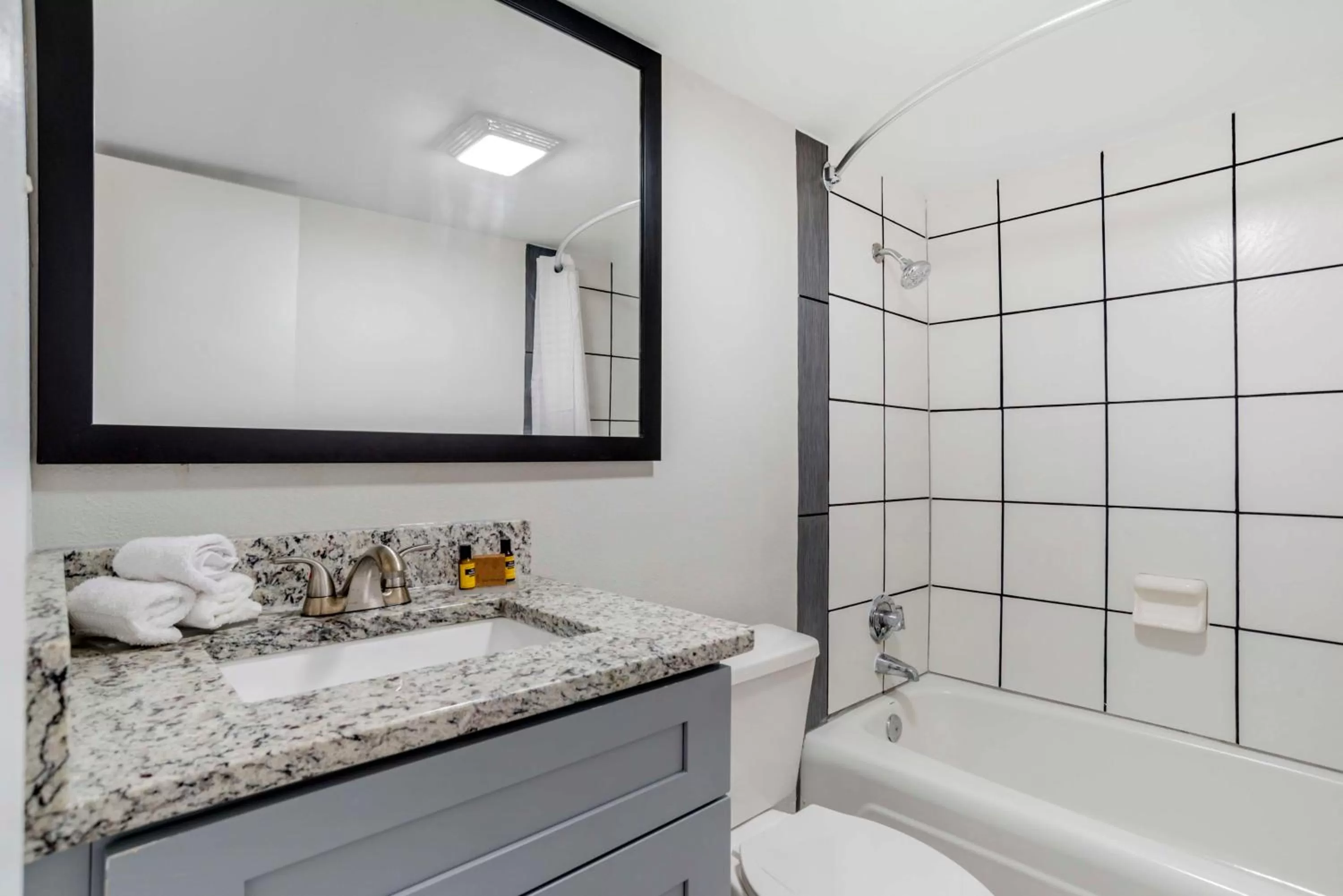 Bathroom in Chateau Beachfront Hotel, a By the Sea Resort