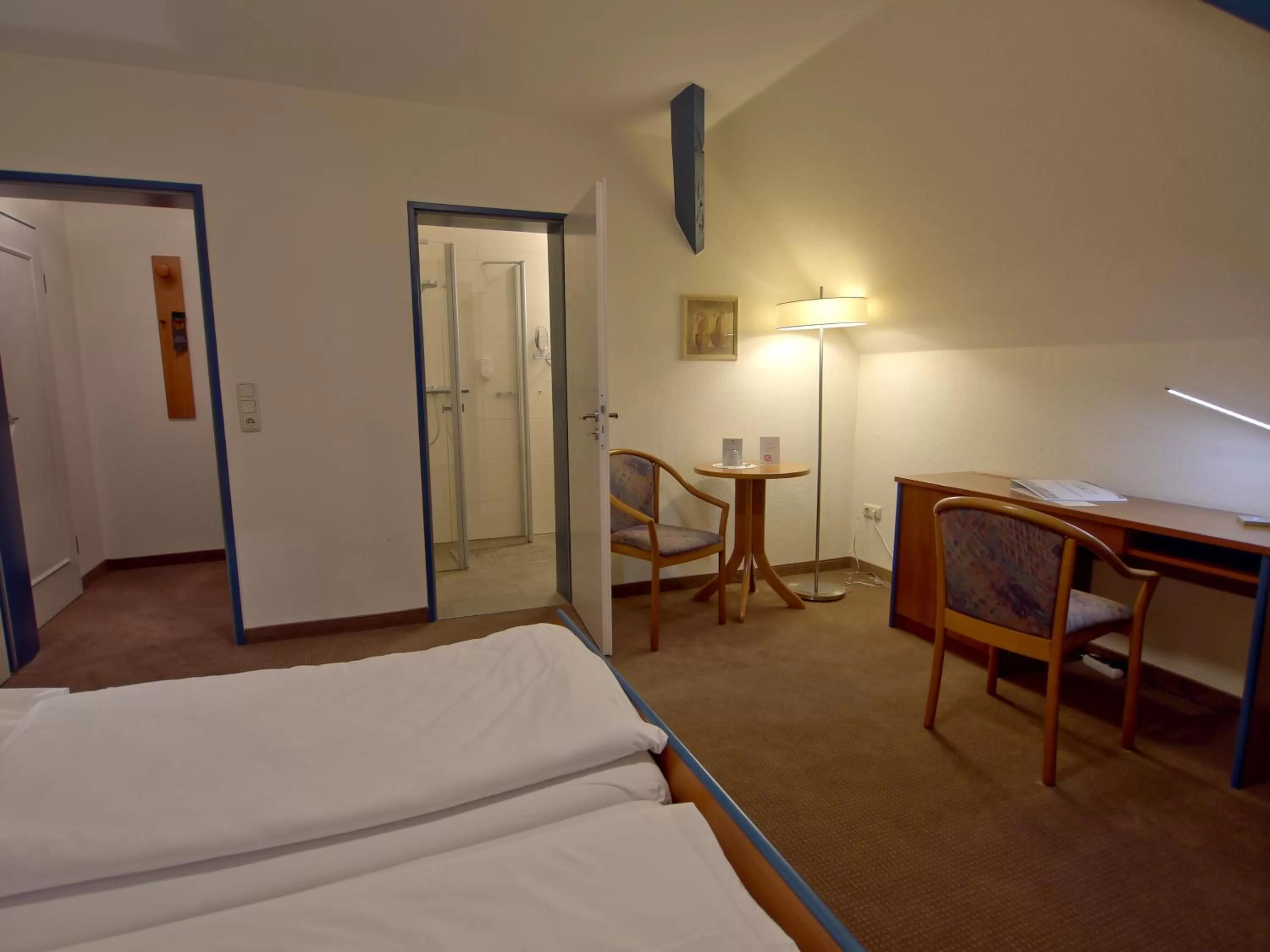 Bed in Hotel Friesische Wehde