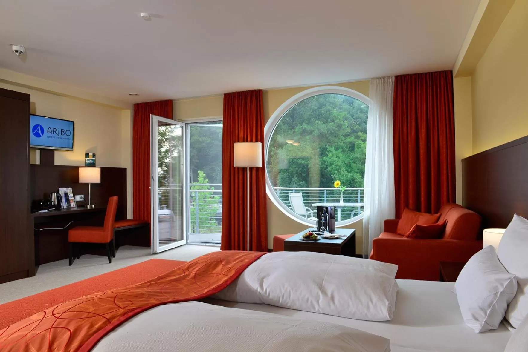 Photo of the whole room, Bed in Aribo Hotel