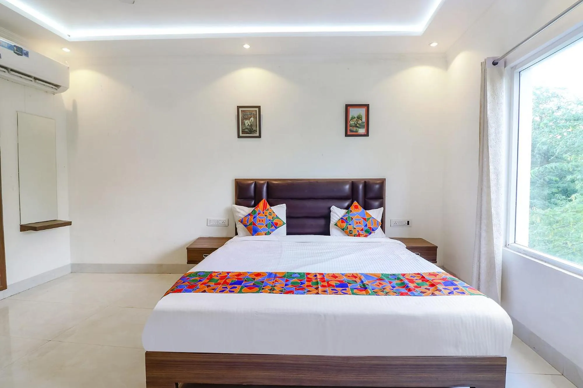 Bed in FabHotel Bhawana