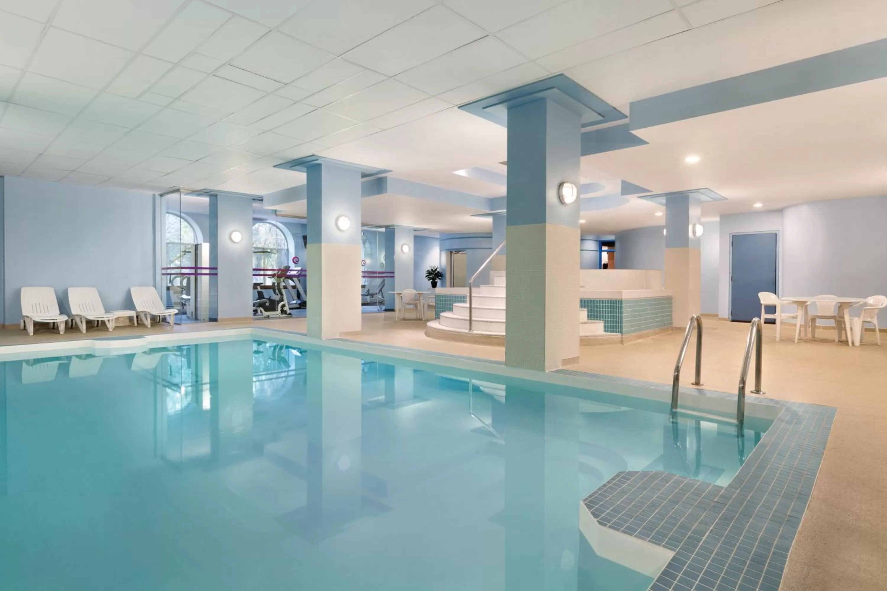 Swimming pool in Coast Edmonton Plaza Hotel by APA