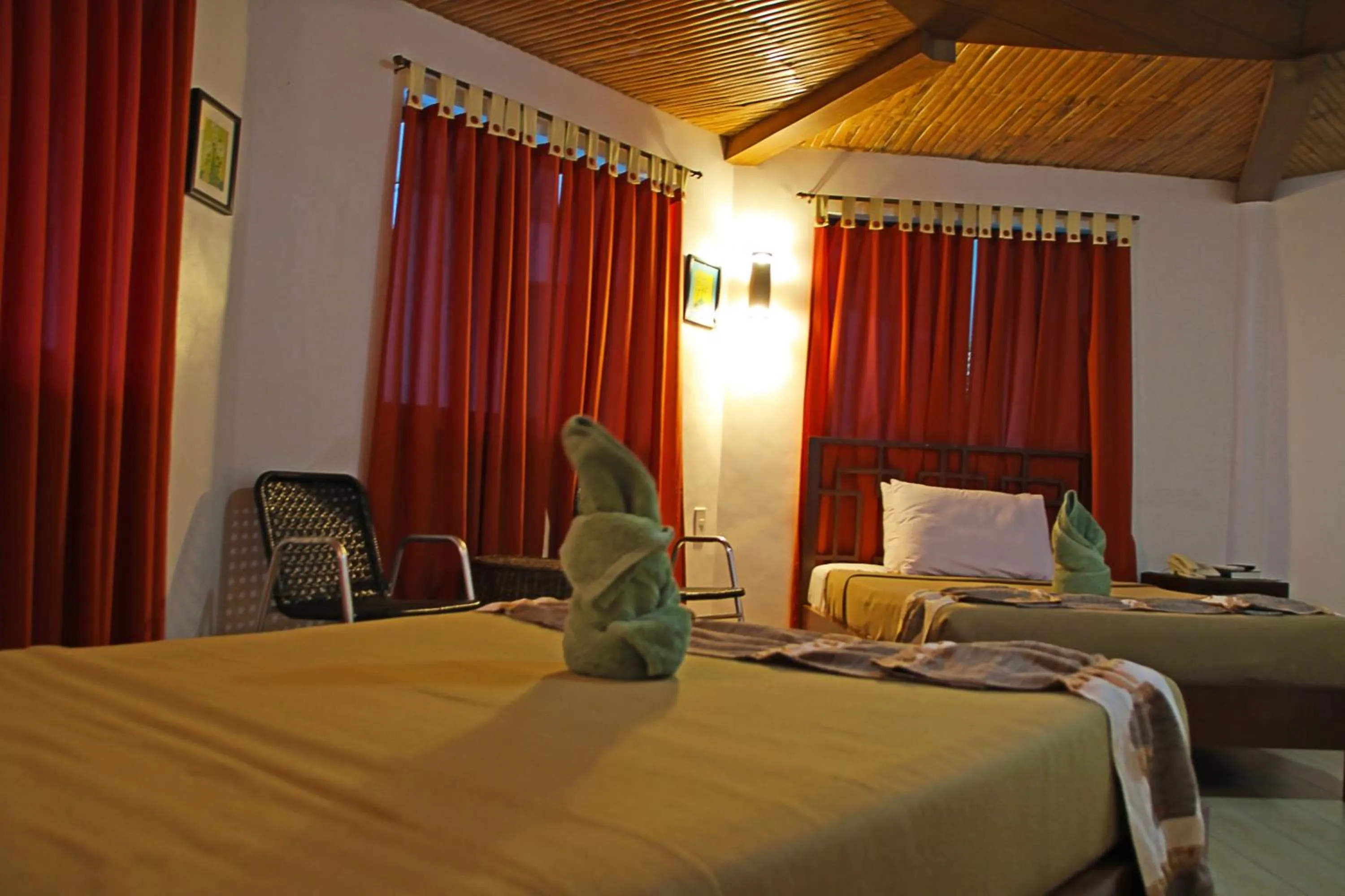 Photo of the whole room, Bed in Coron Hilltop View Resort