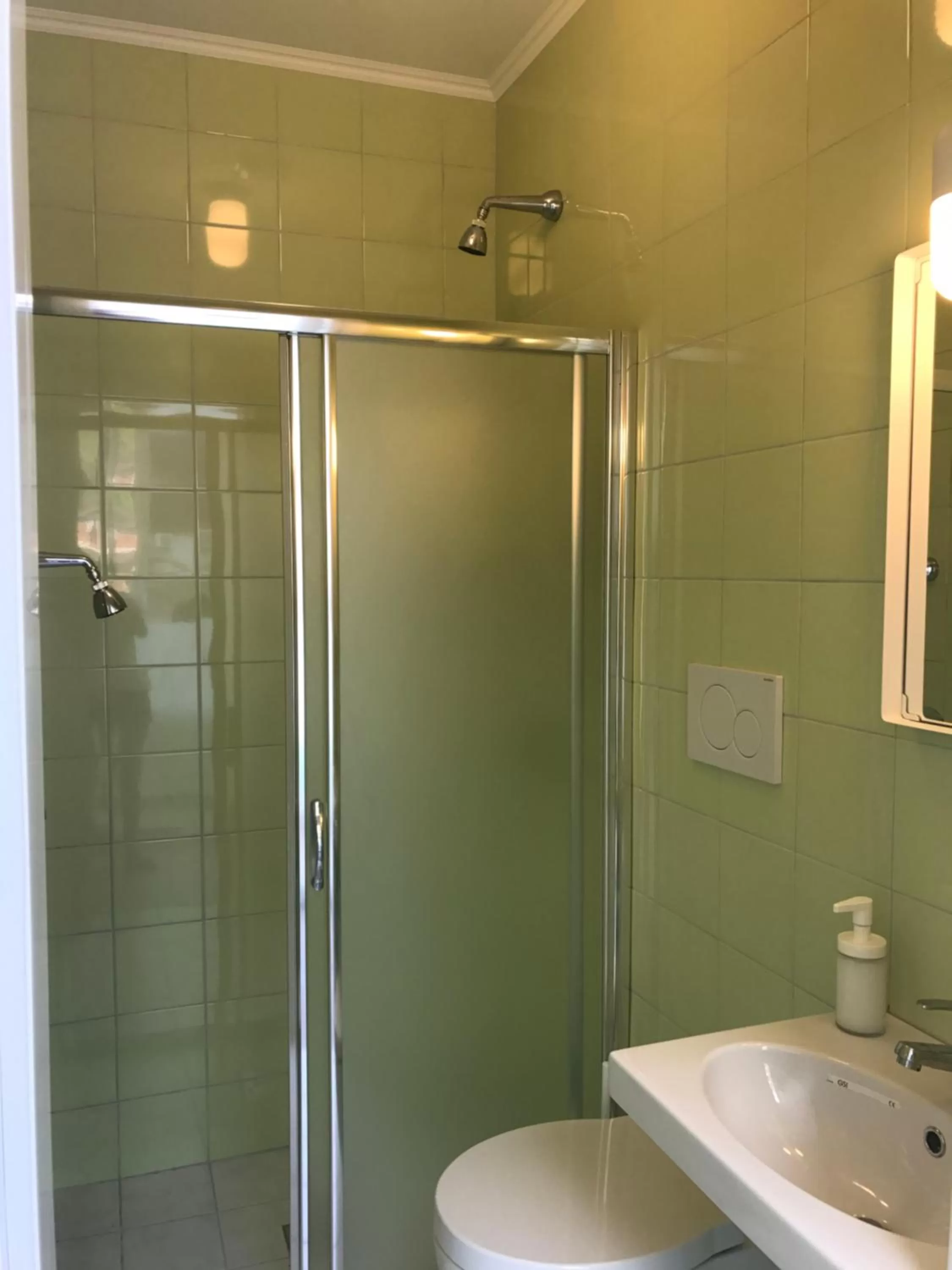 Bathroom in Aleksi rooms