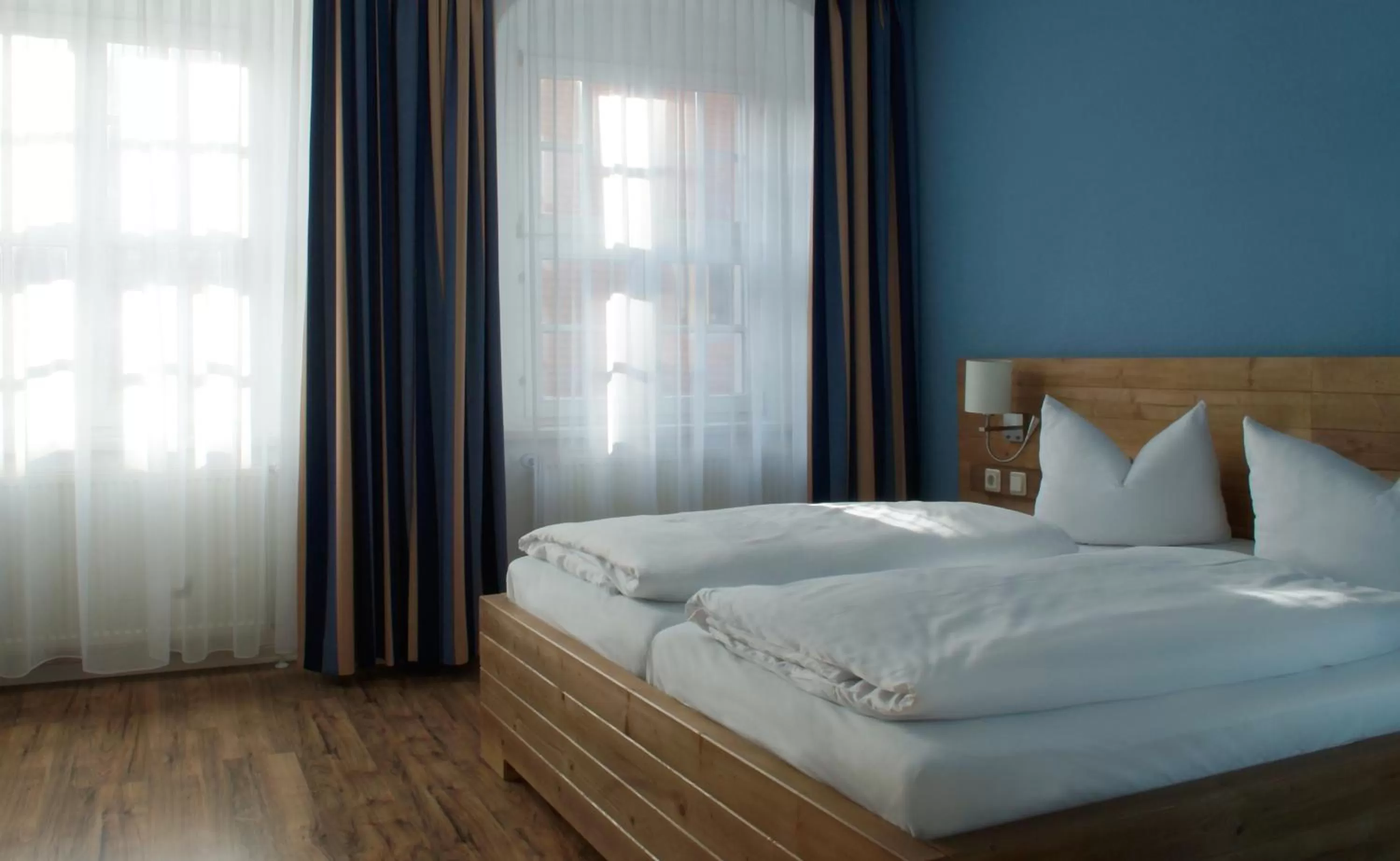 Photo of the whole room, Bed in Hotel Am Obermarkt