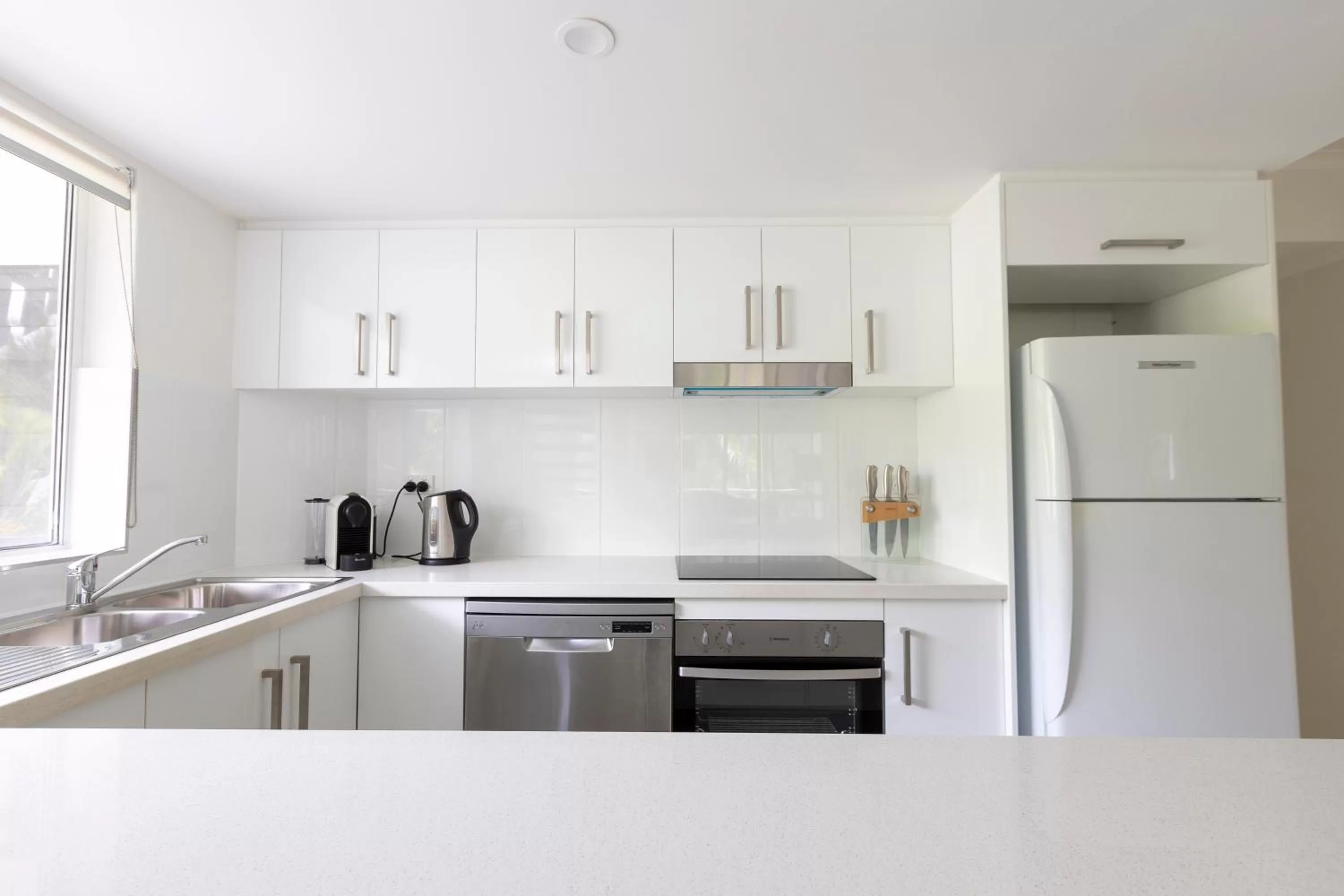 Communal kitchen in The White House Port Douglas