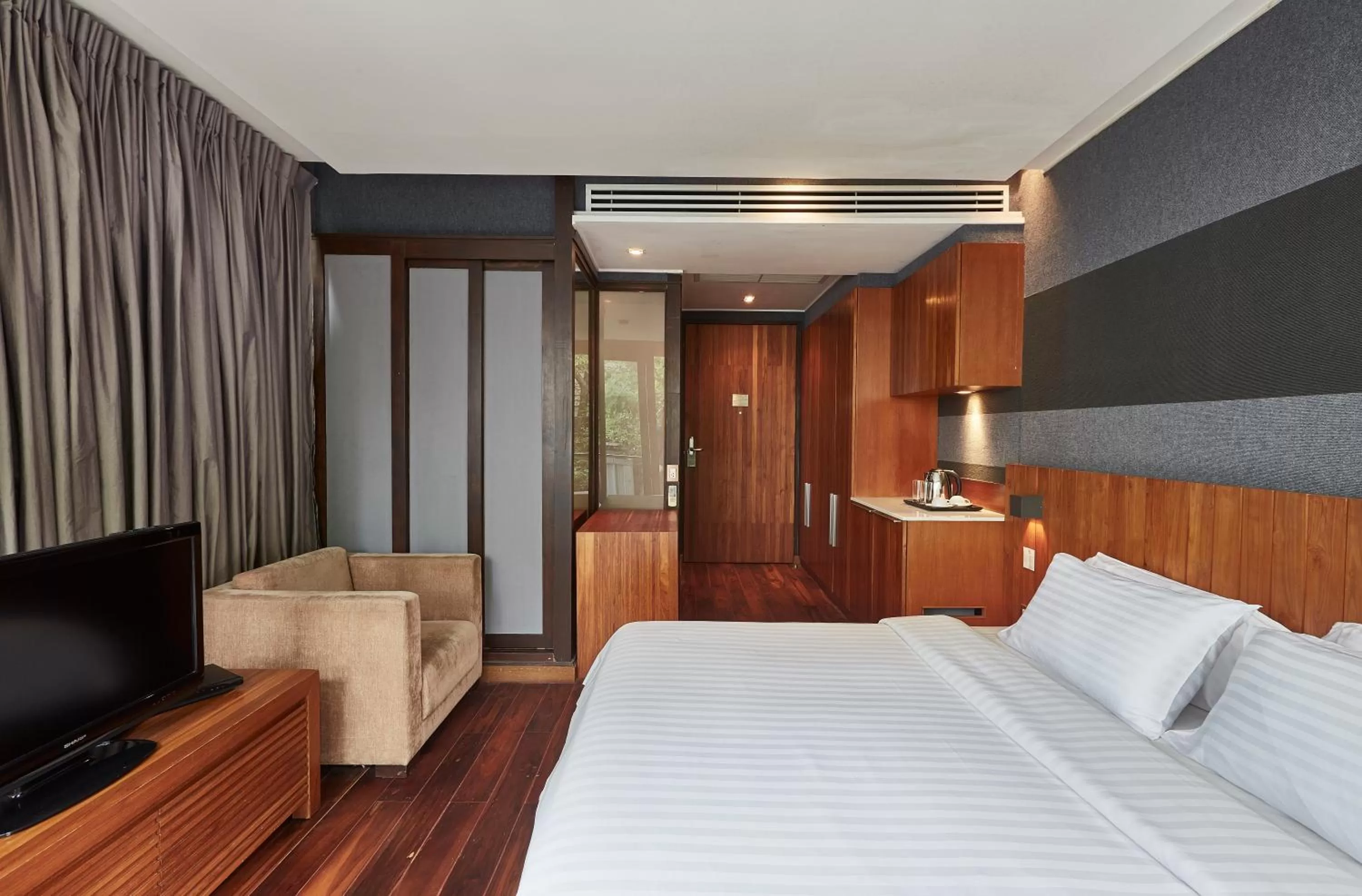 Bed in LUXX Langsuan Hotel - SHA Plus