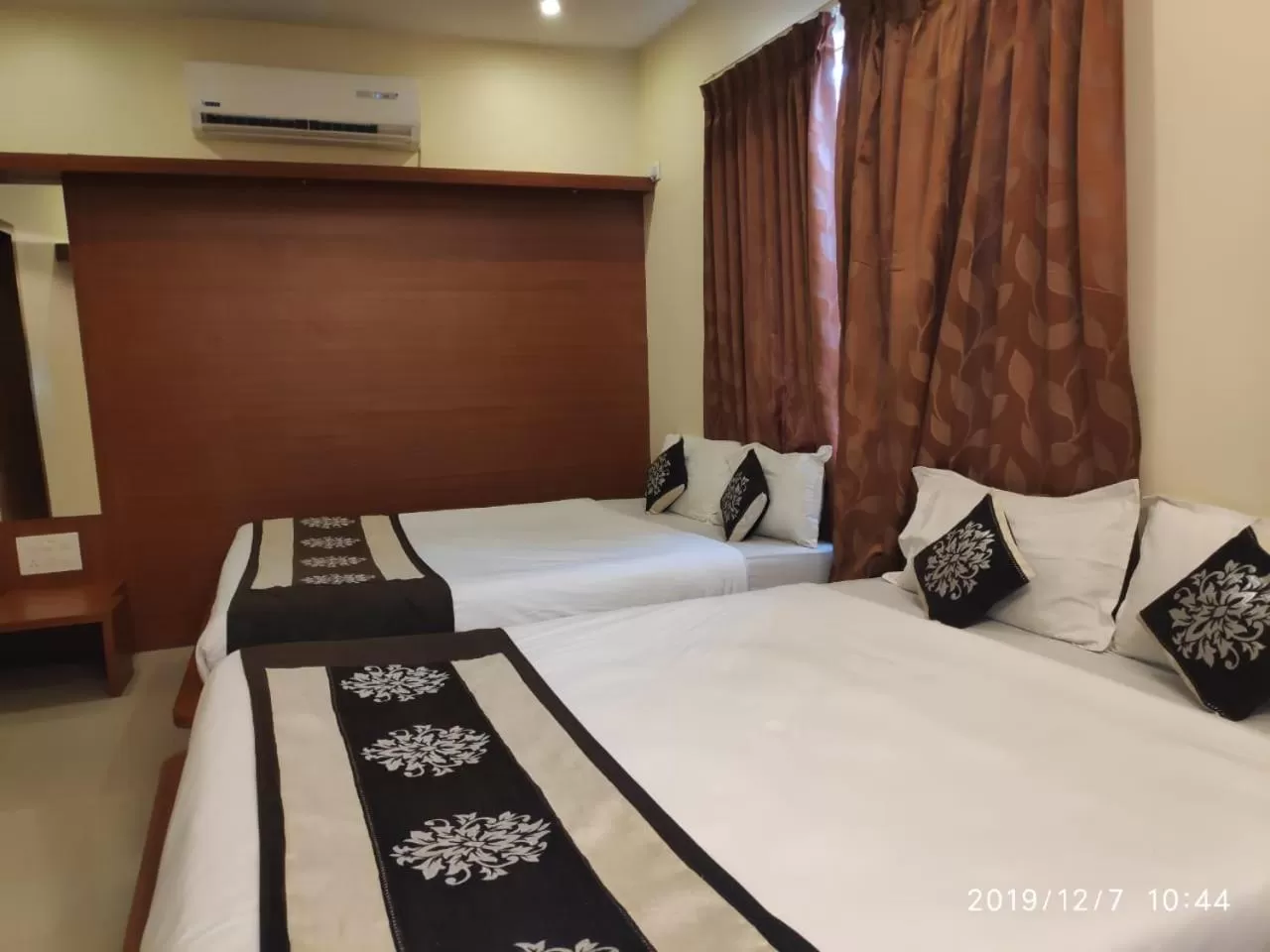 Photo of the whole room, Bed in The Grand Inn Mysore