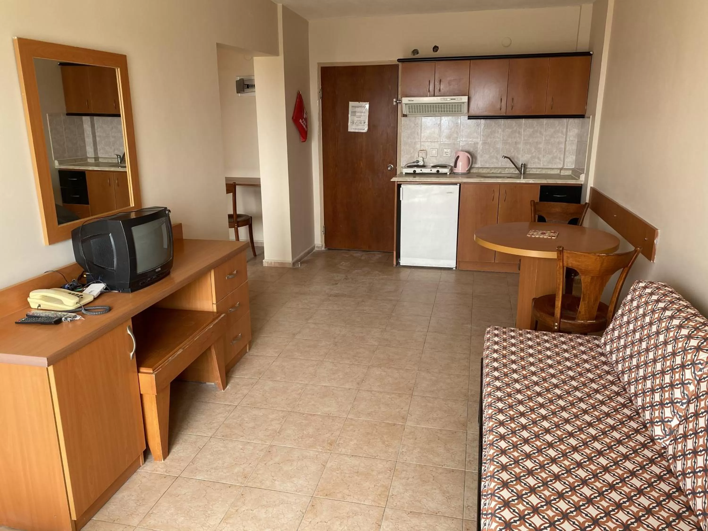 Kitchen or kitchenette in Tuntas Family Suites Kusadasi