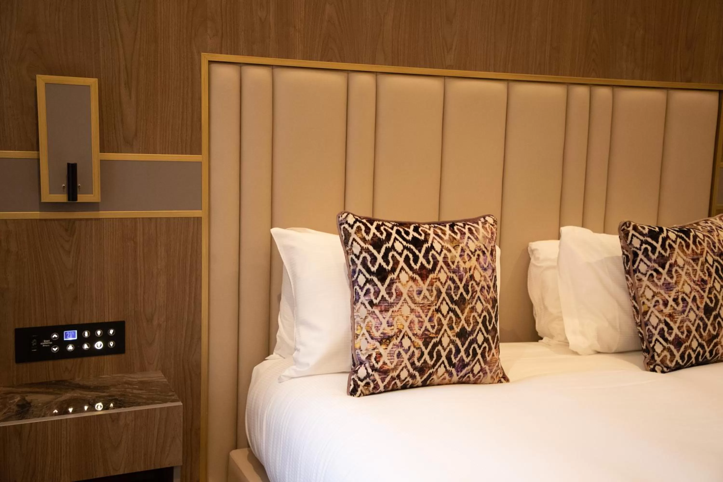 Bed in Merit Kensington Hotel