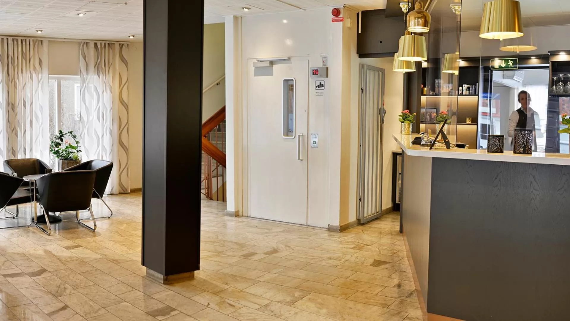 Lobby or reception in Hotel Amadeus by First