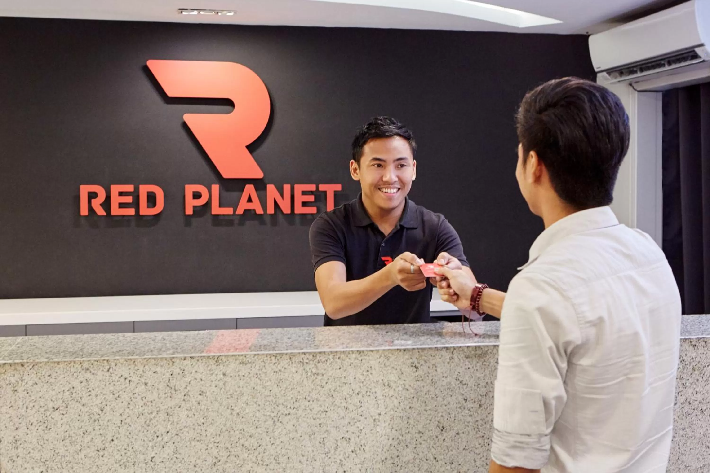 Staff in Red Planet Manila Malate Mabini