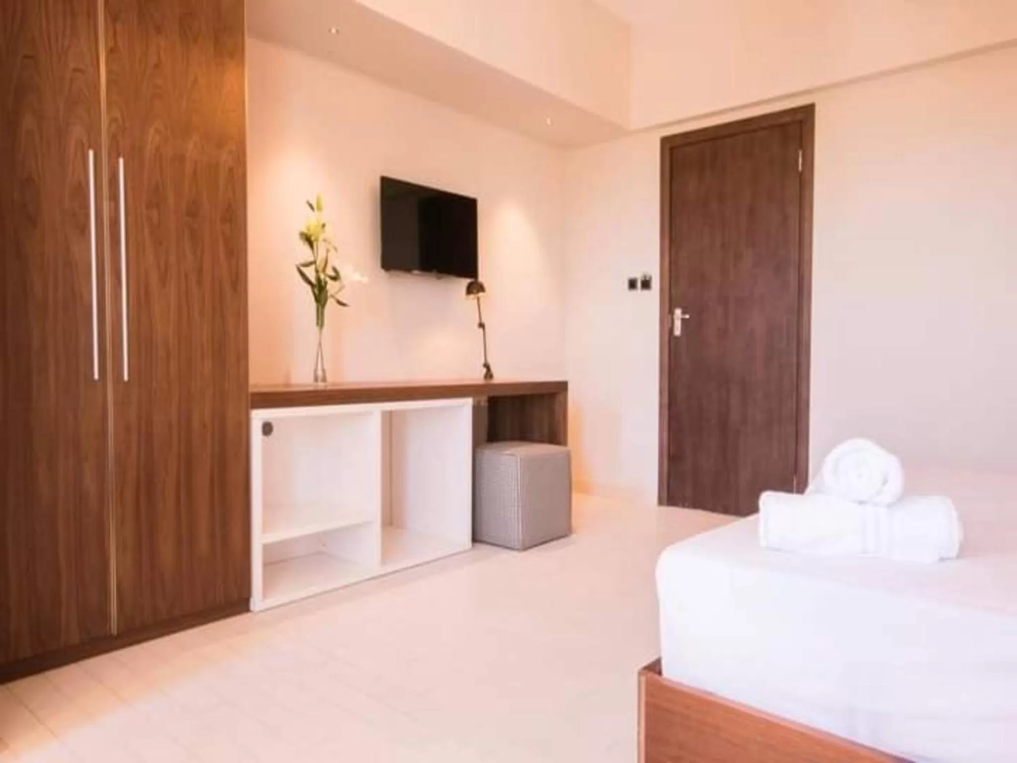 Bed in Azure Beach Boutique Hotel